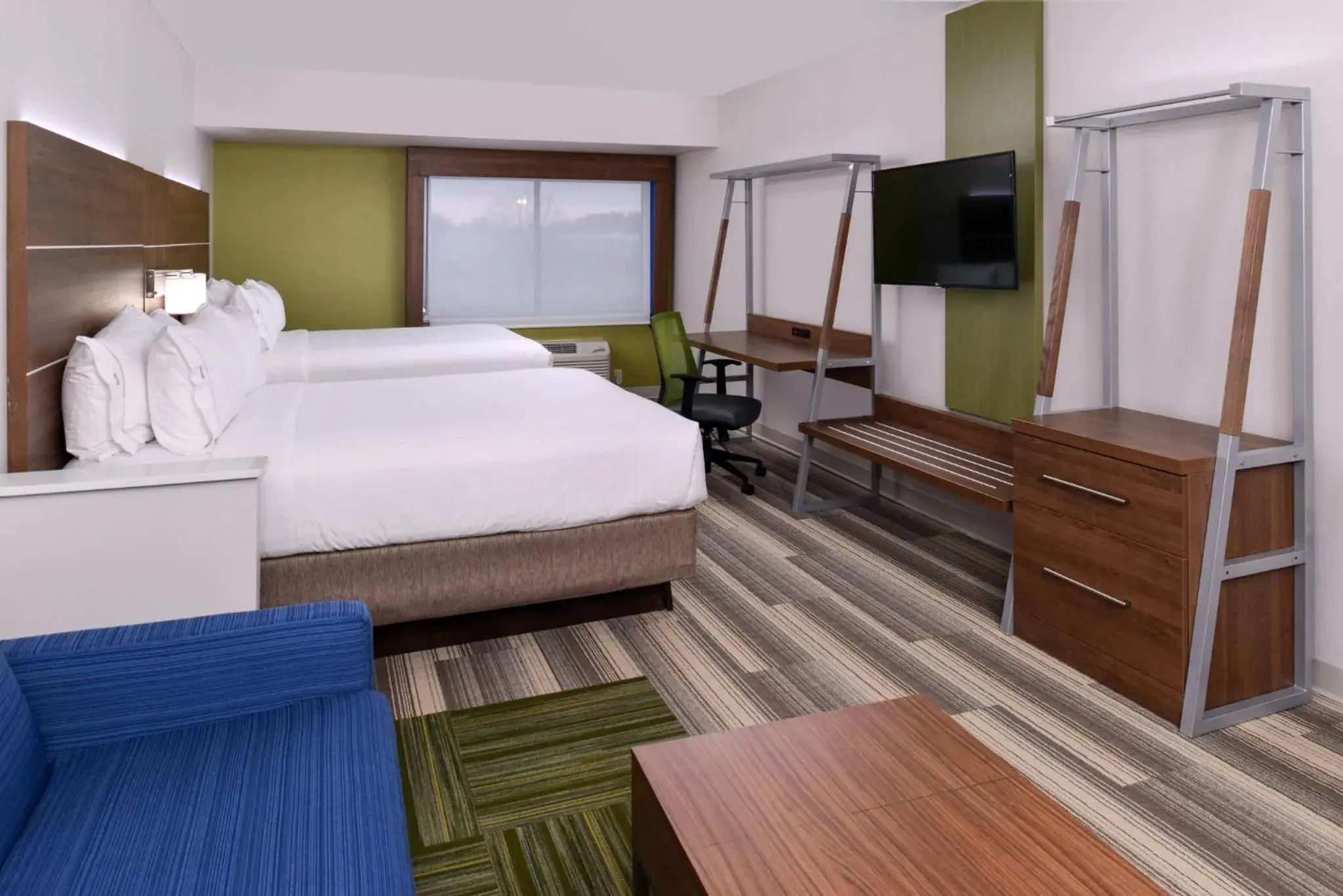 Photo of the whole room, Bed in Holiday Inn Express & Suites Raleigh NE - Medical Ctr Area by IHG Photo of the whole room, Bed in Holiday Inn Express & Suites Raleigh NE - Medical Ctr Area by IHG