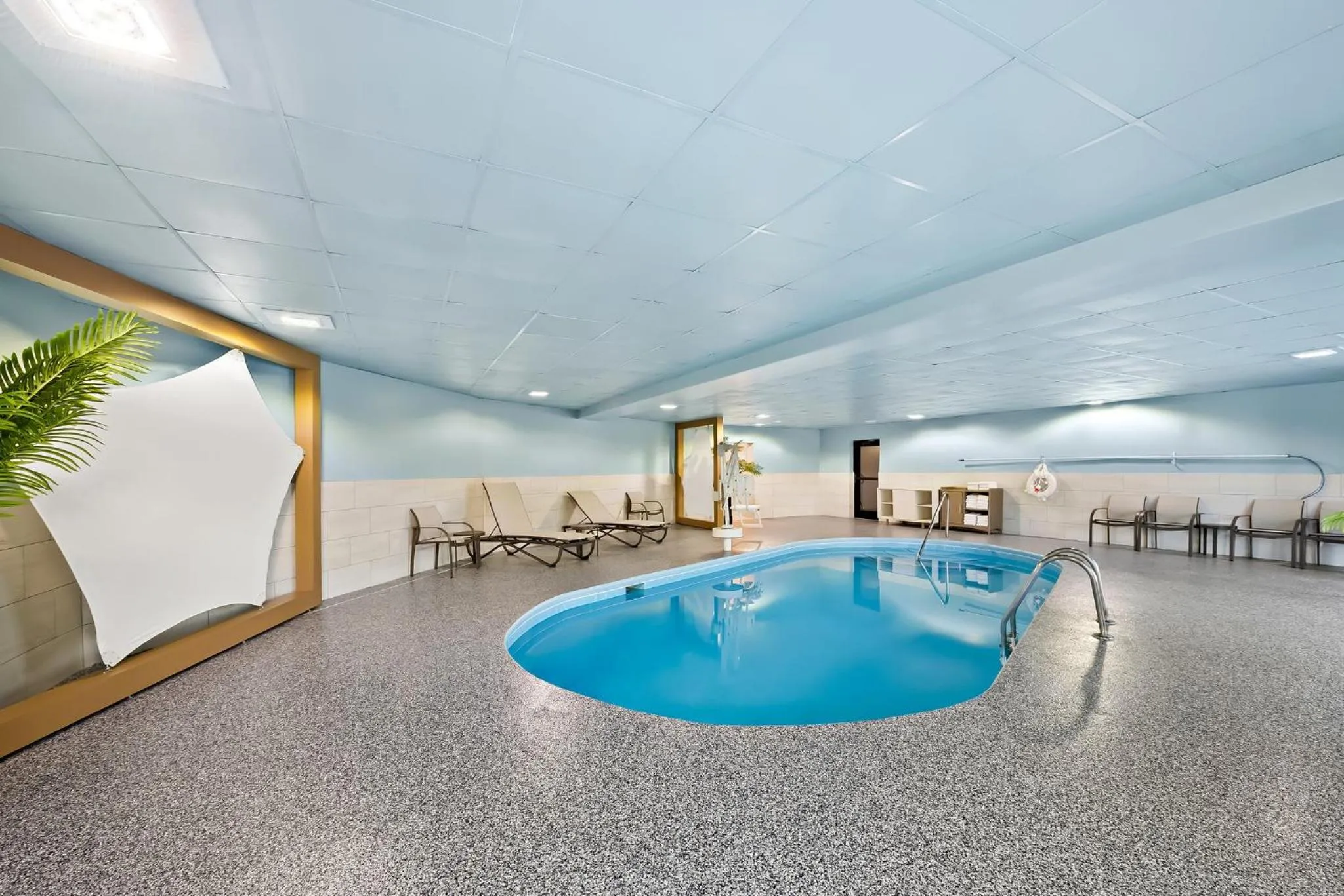 Swimming pool in Holiday Inn Express & Suites Raleigh NE - Medical Ctr Area by IHG