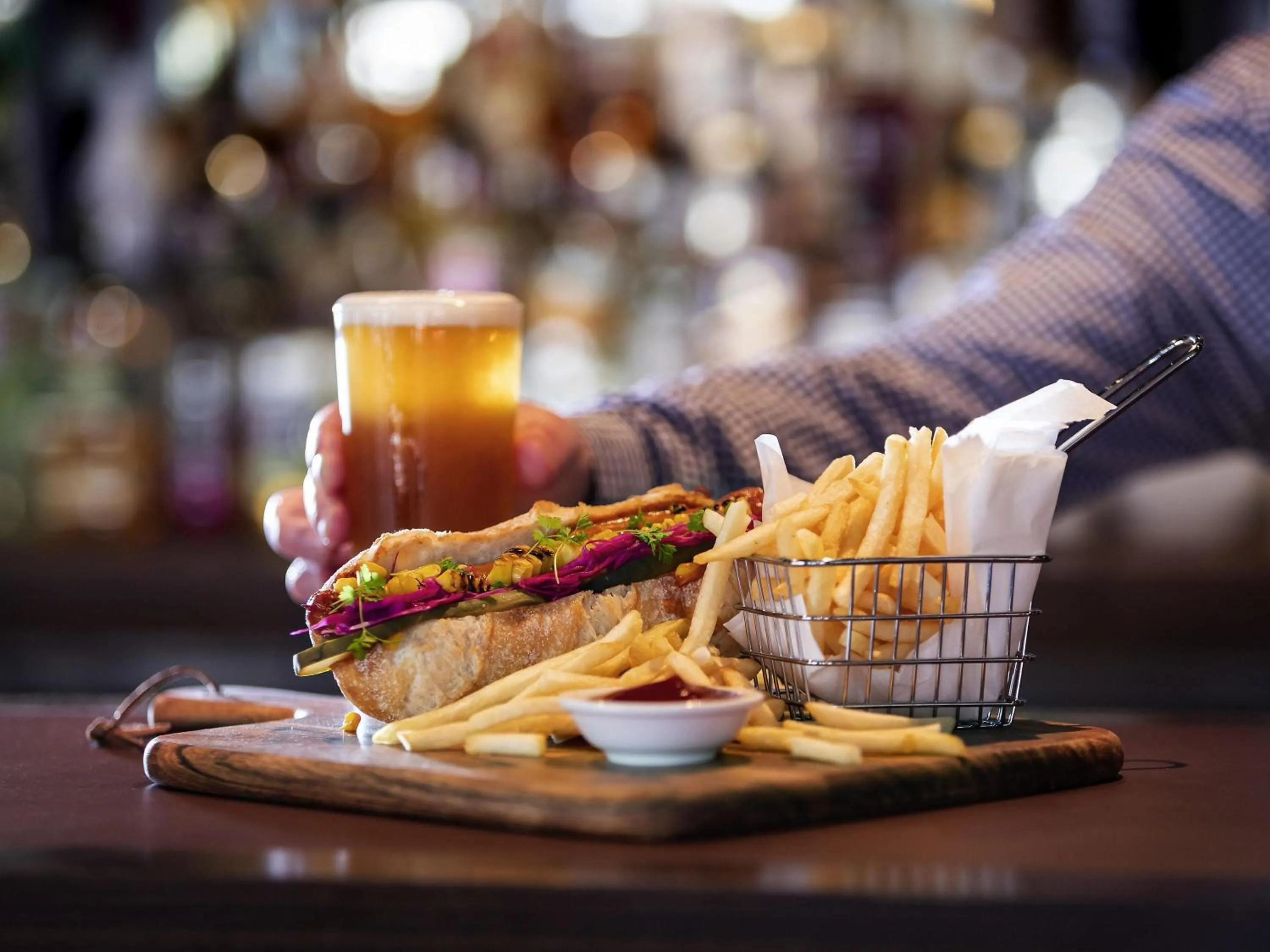 Lounge or bar in Novotel Canberra