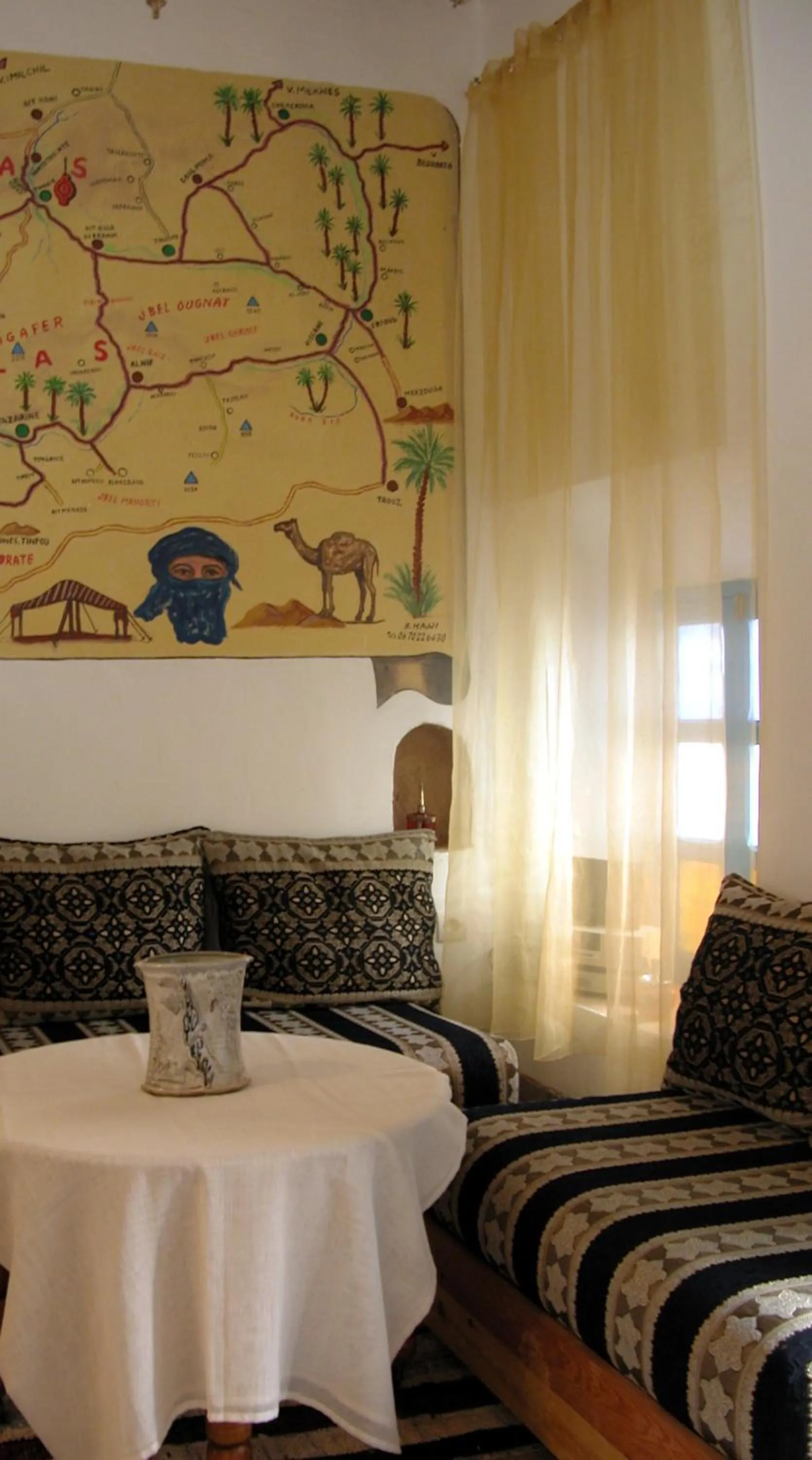 Communal lounge/ TV room in Kasbah Iswan