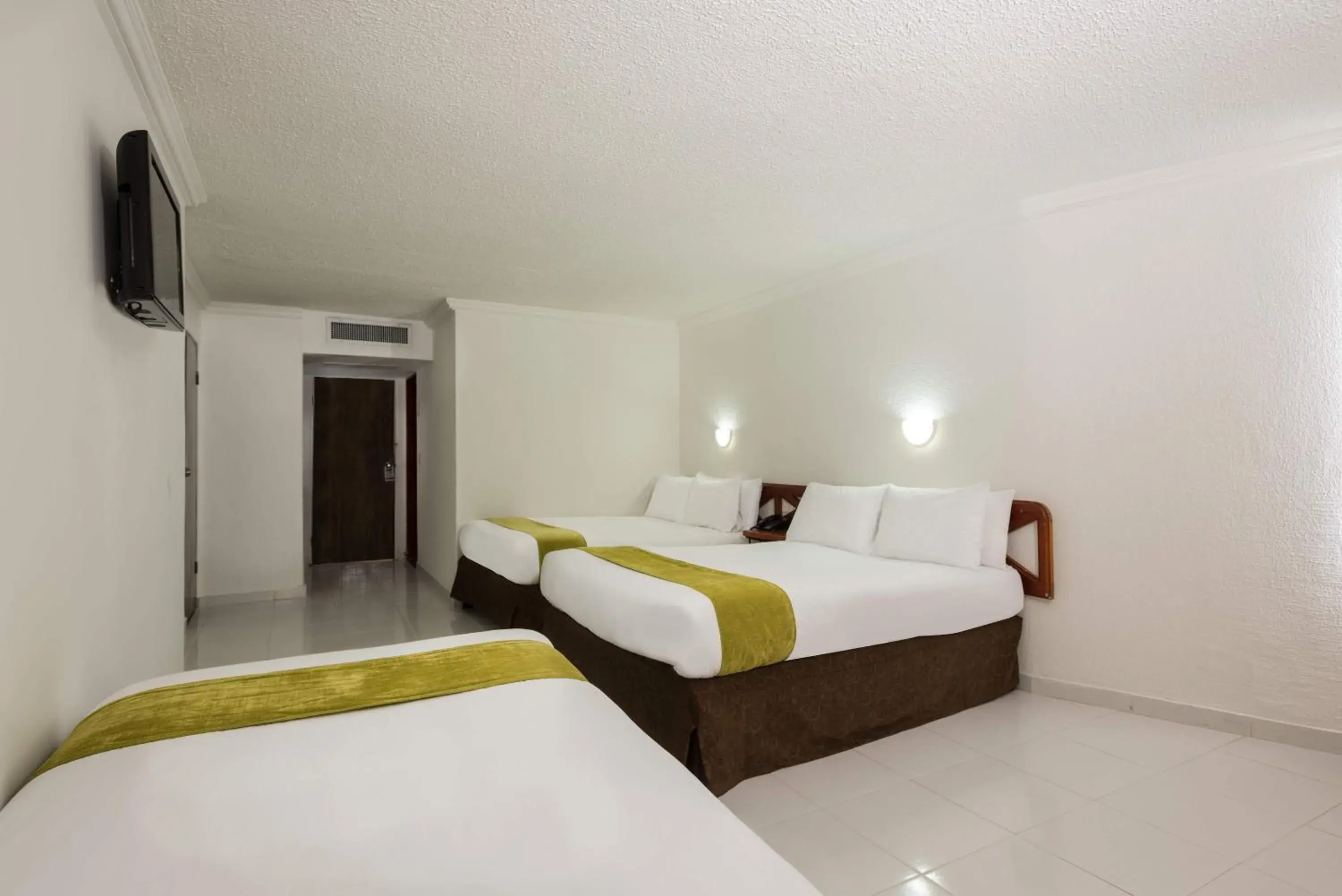 Bed in Calypso Beach Hotel Bed in Calypso Beach Hotel