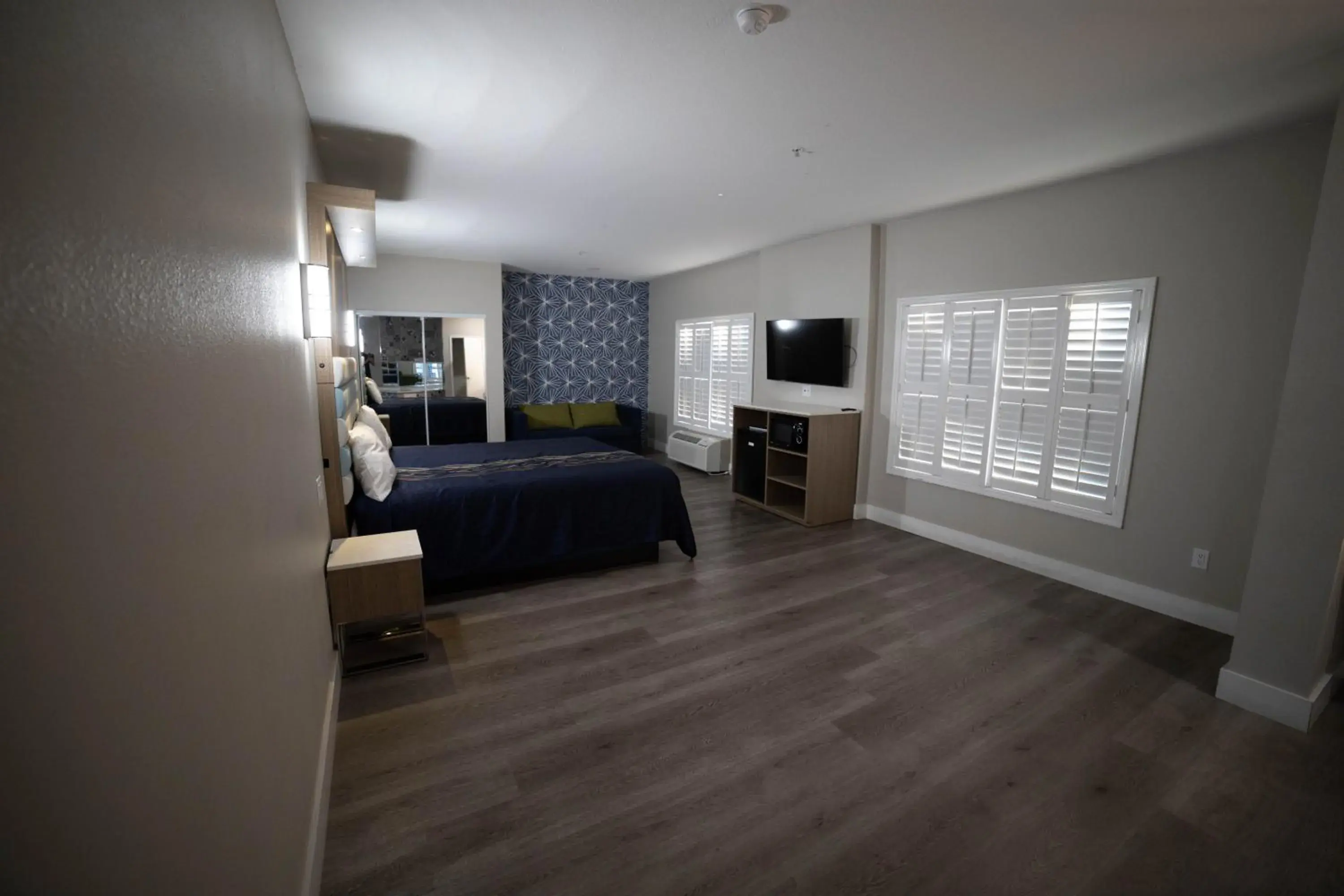 Photo of the whole room, Bed in Mid City Inn & Suites Pico Rivera Photo of the whole room, Bed in Mid City Inn & Suites Pico Rivera