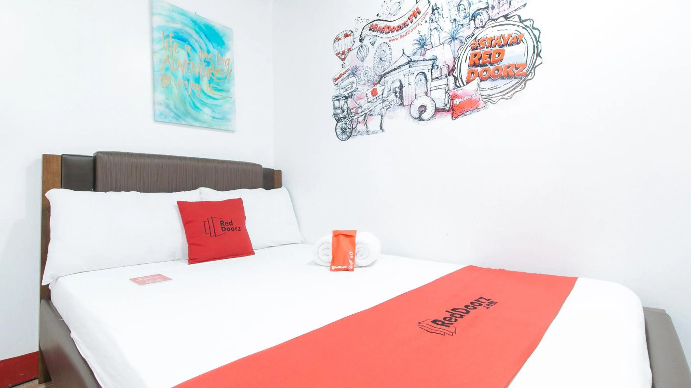 Bed in RedDoorz near Quirino Station Manila