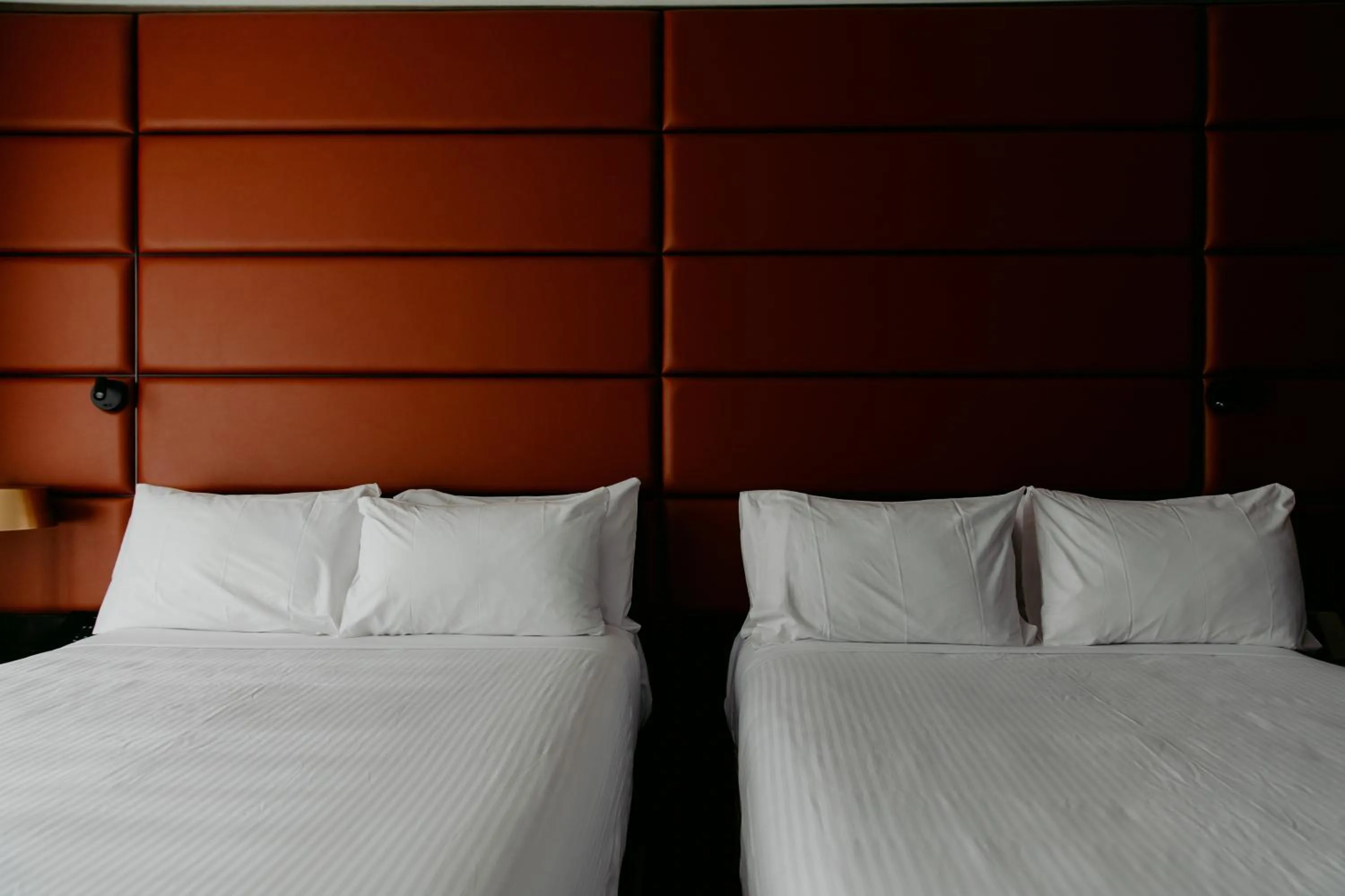 Bed in Mercure Sydney Parramatta