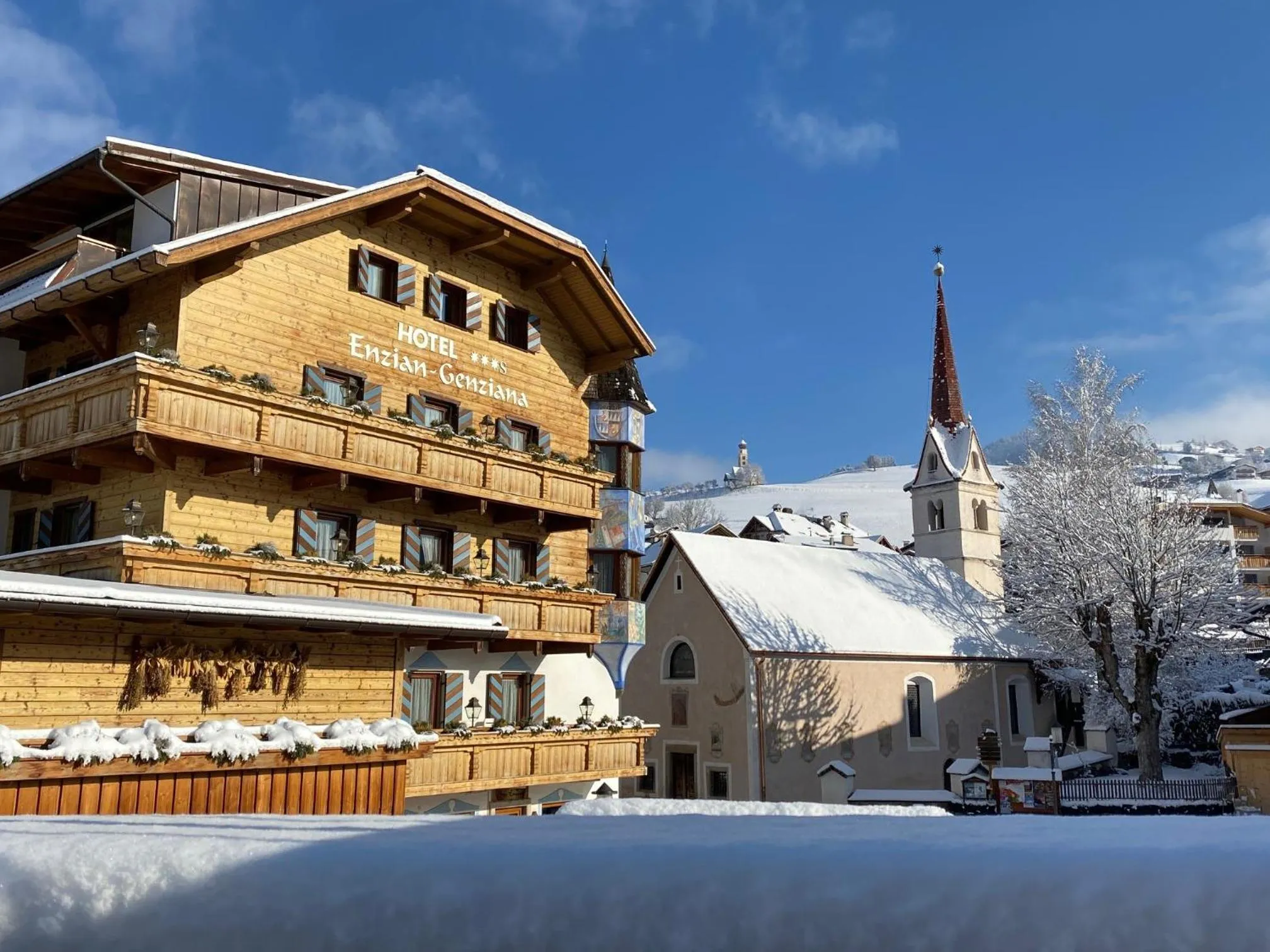 Property building in Hotel Enzian Genziana