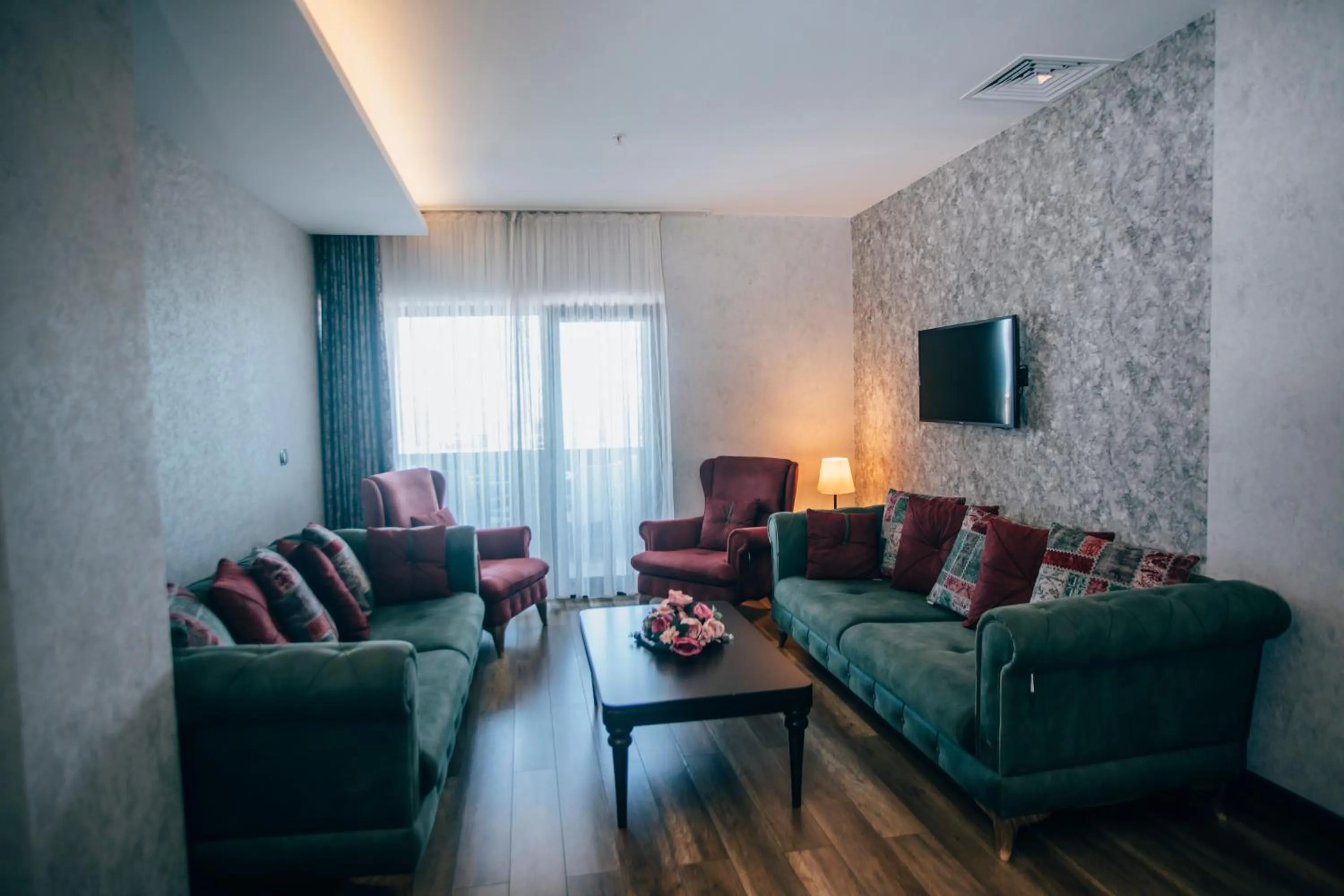 Communal lounge/ TV room in Life Point Hotel