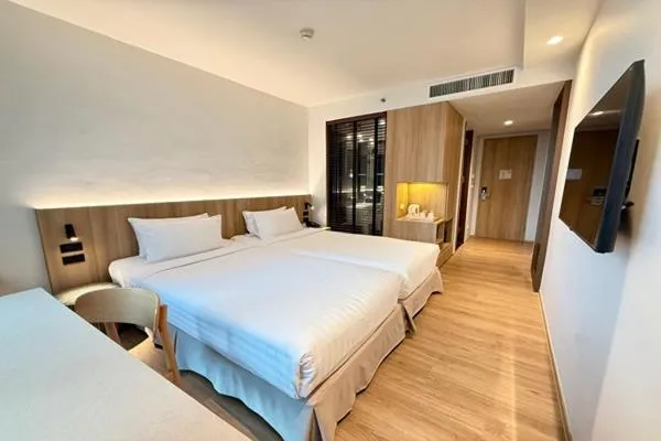 Bed in VIC 3 Bangkok Hotel