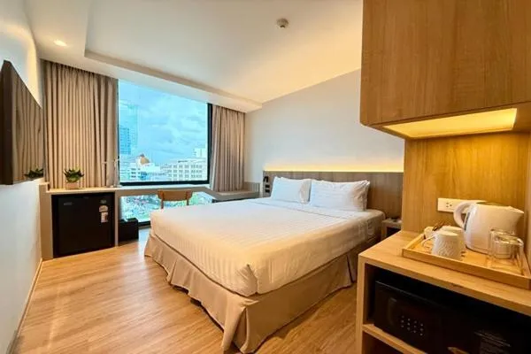 Bed in VIC 3 Bangkok Hotel