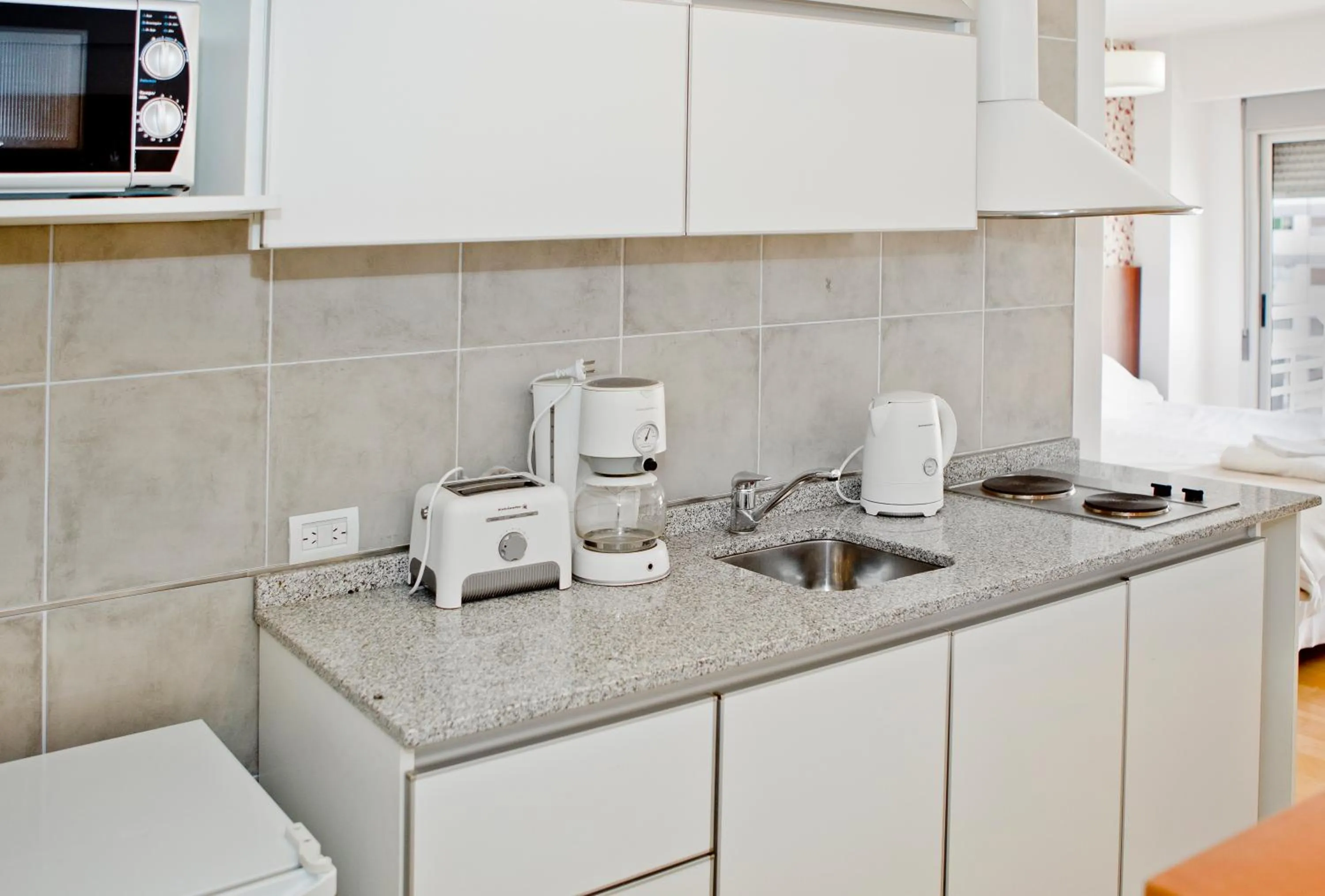 Kitchen or kitchenette in Color Botánico