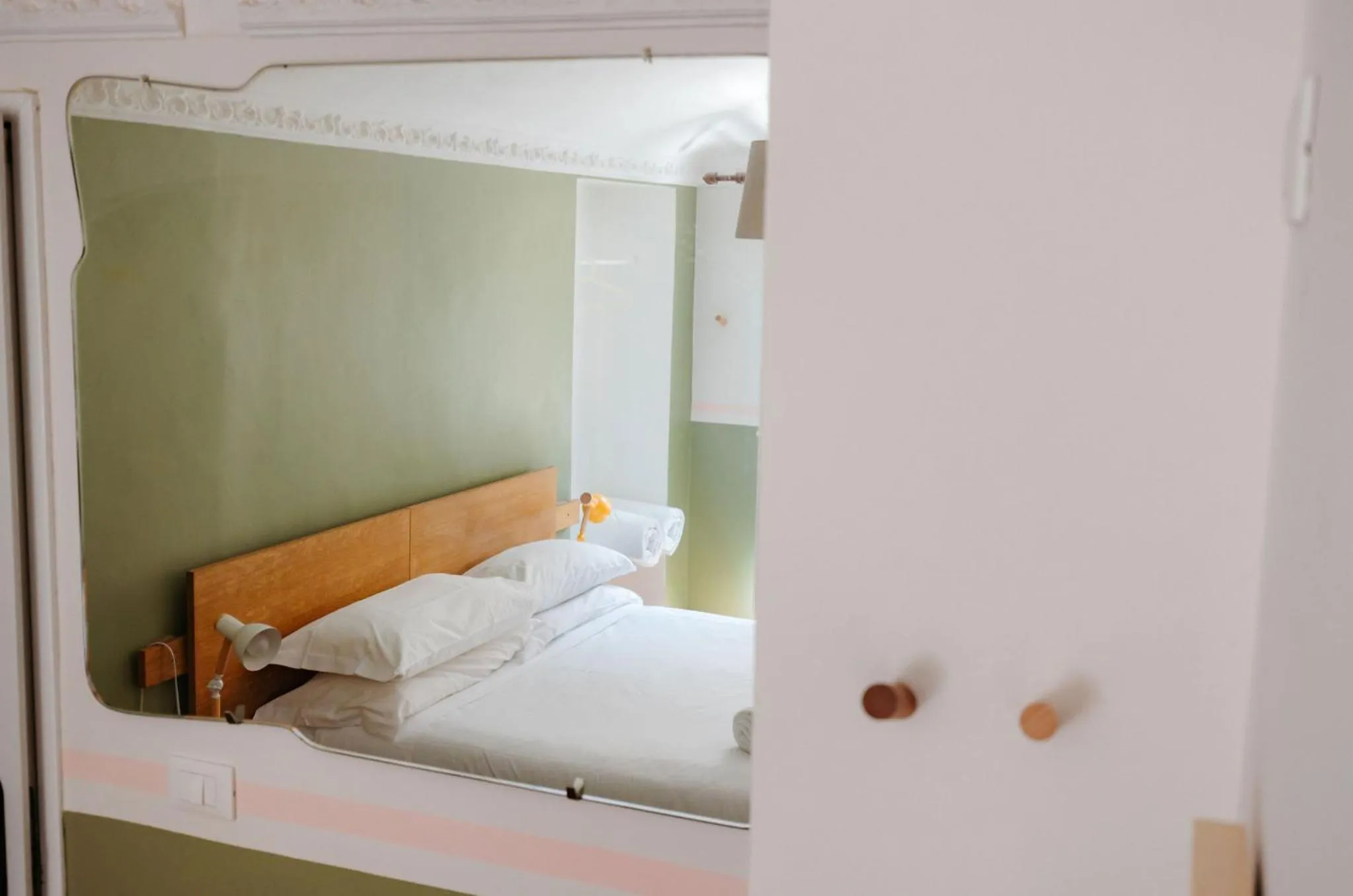 Bed in Tomato Urban Retreat