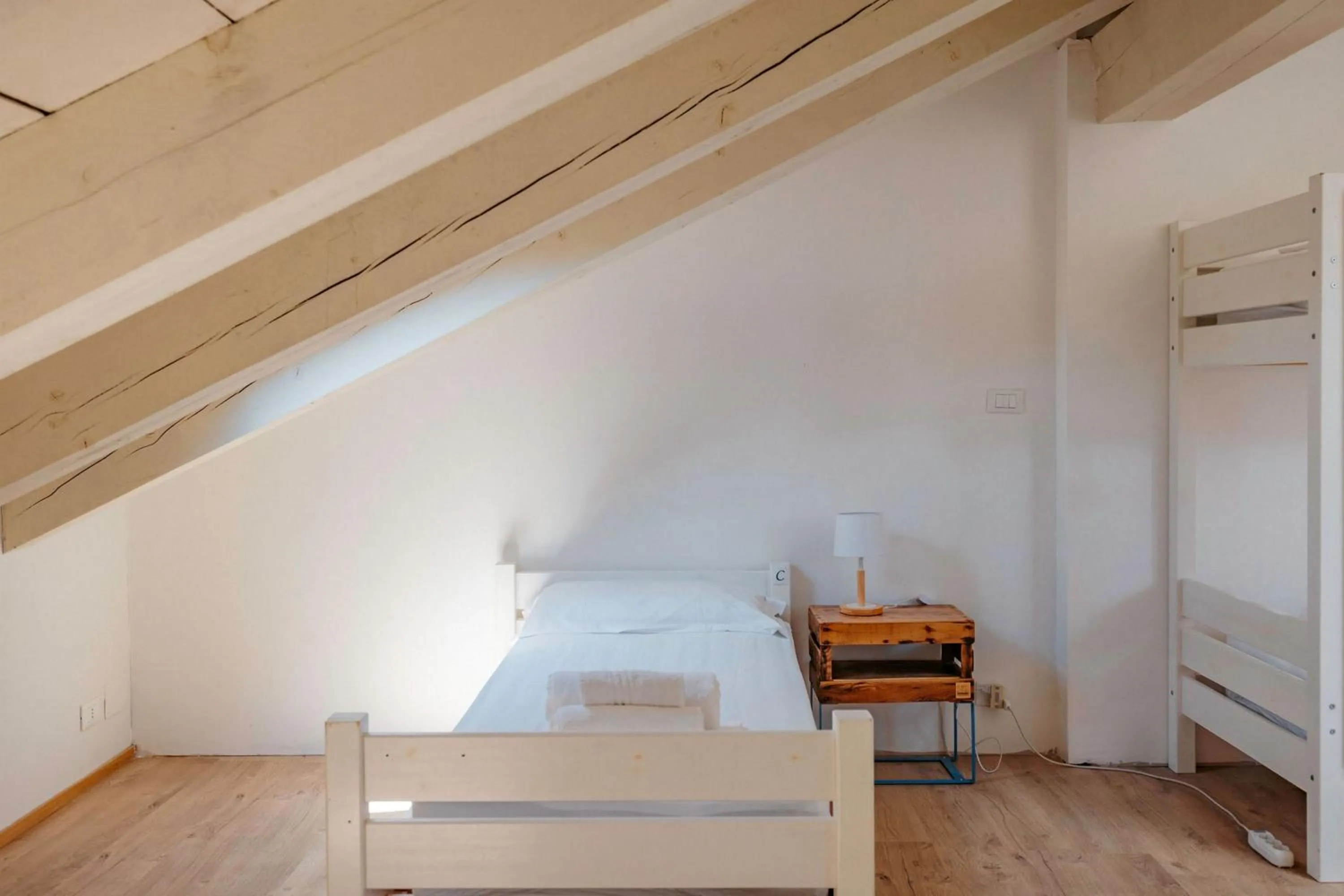 Bed in Tomato Urban Retreat