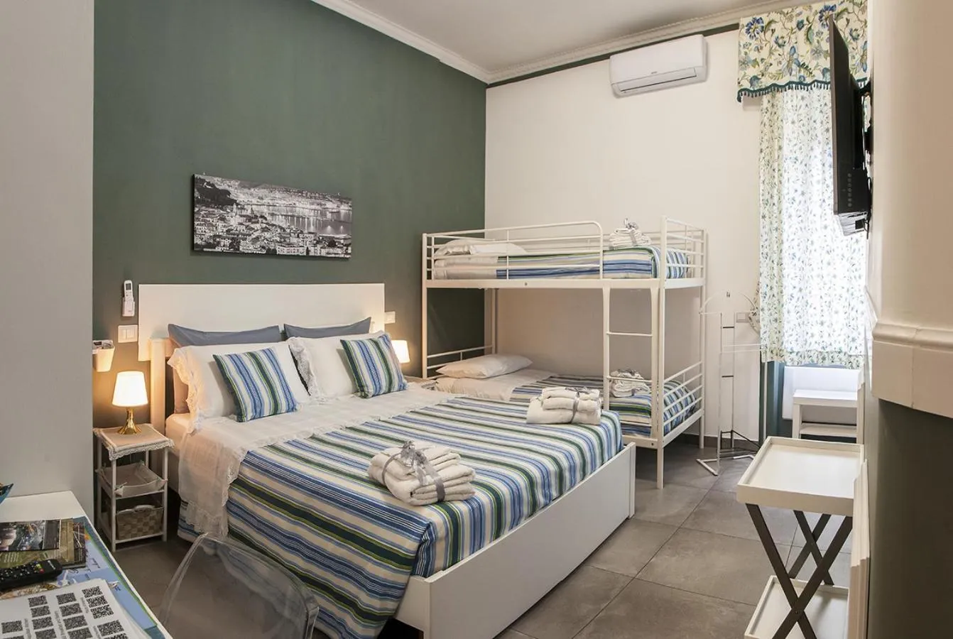 Photo of the whole room, Bed in La Terrazza ai Miracoli