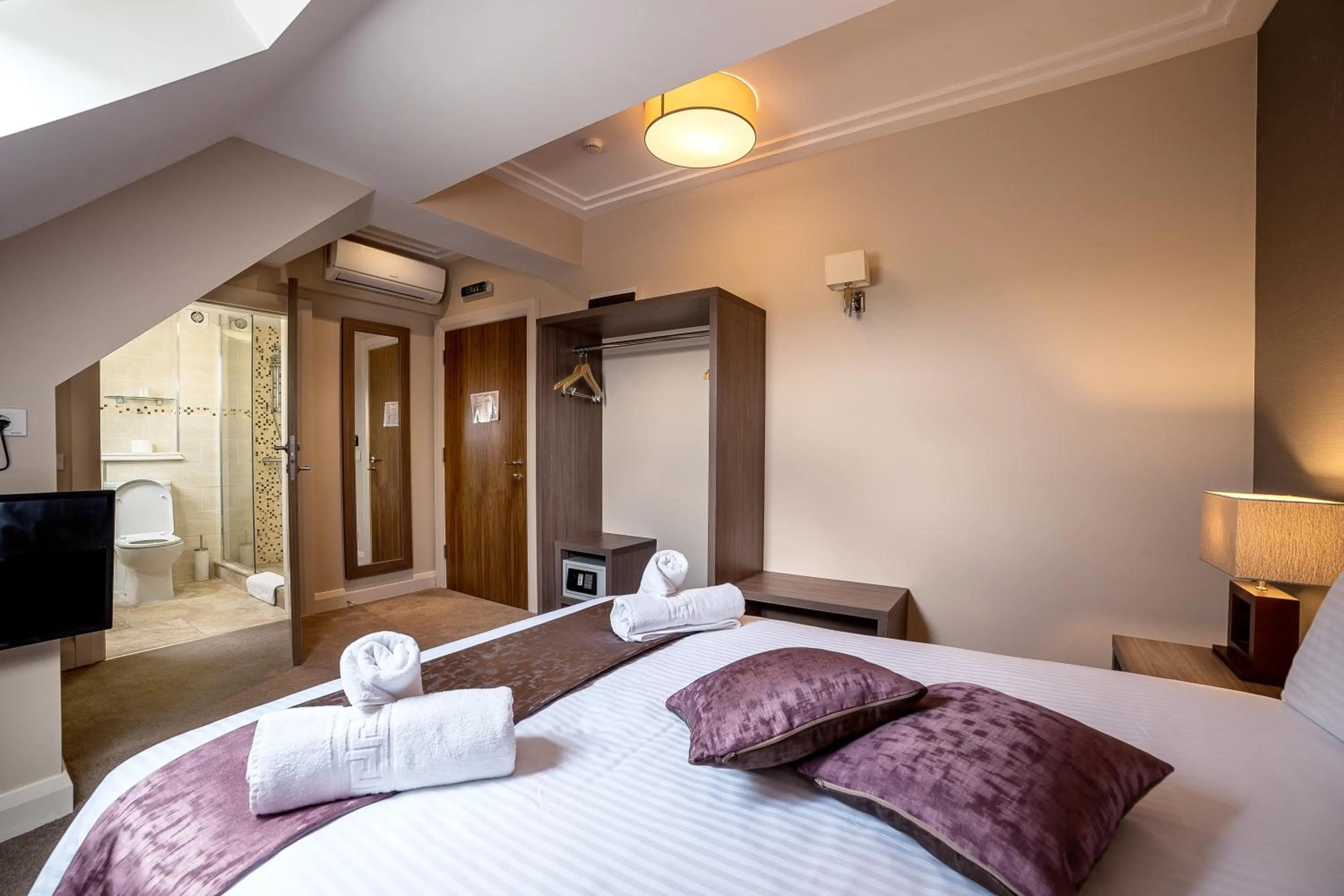 Bed in The Frontier Hotel