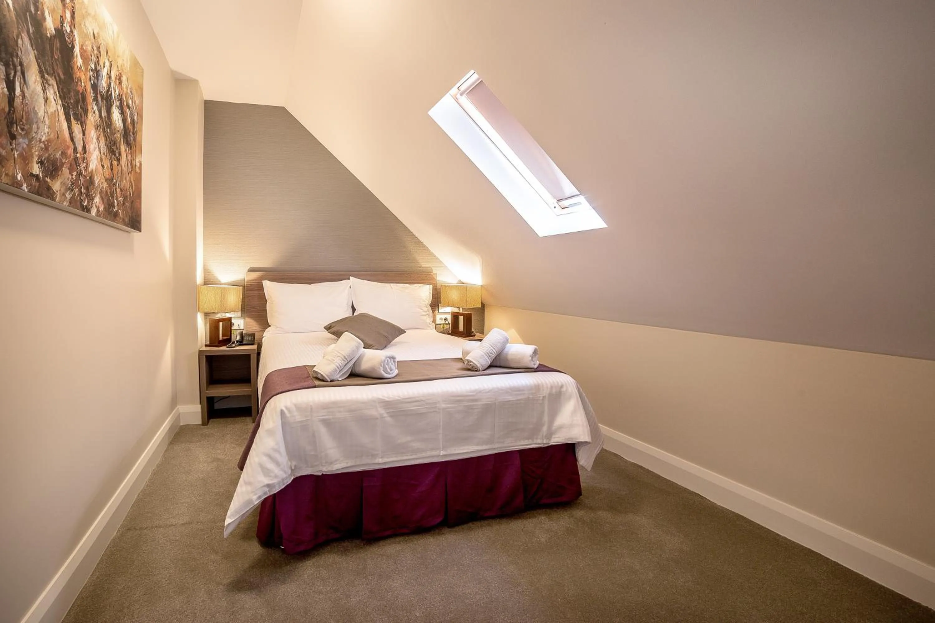 Bed in The Frontier Hotel