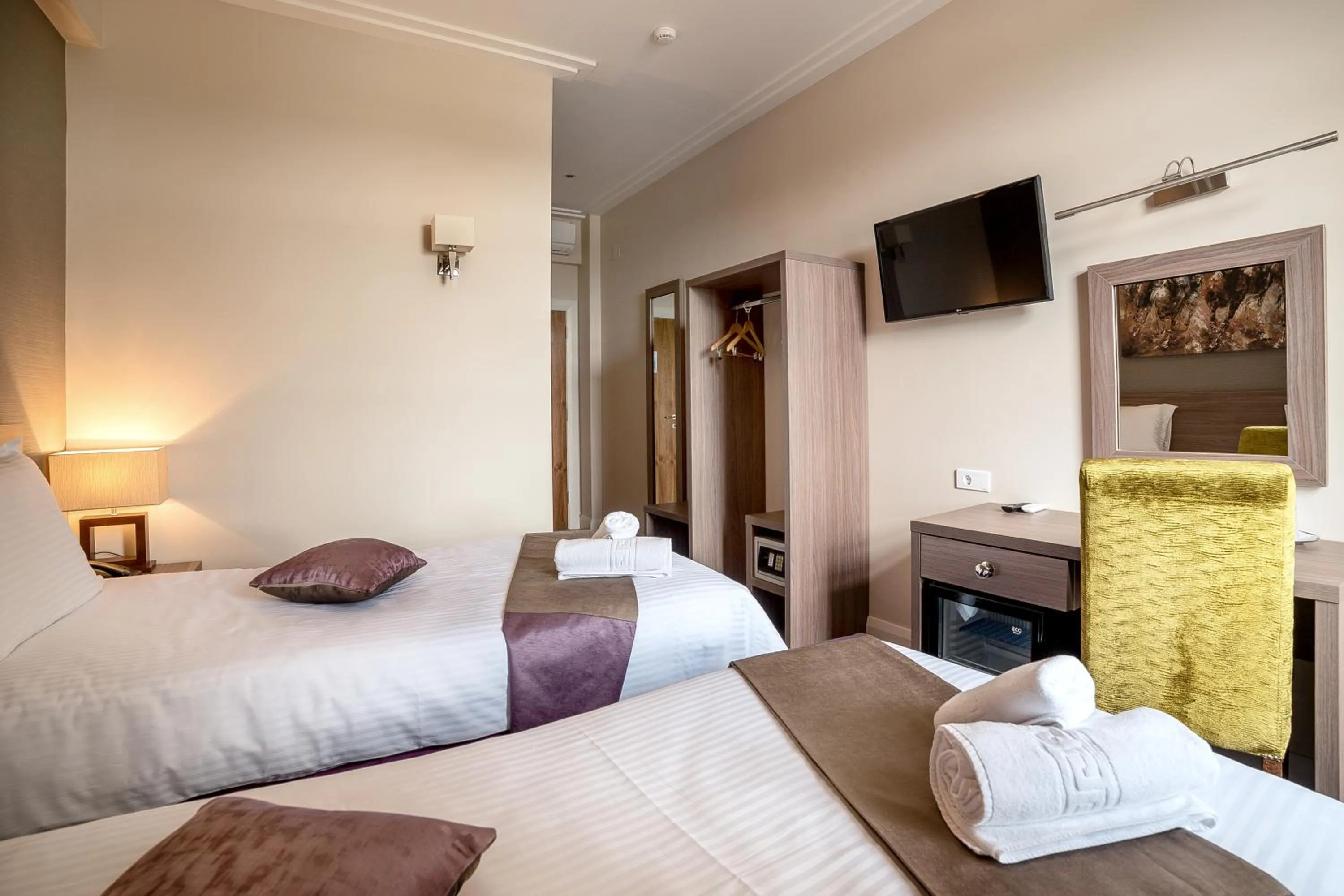 Bed in The Frontier Hotel