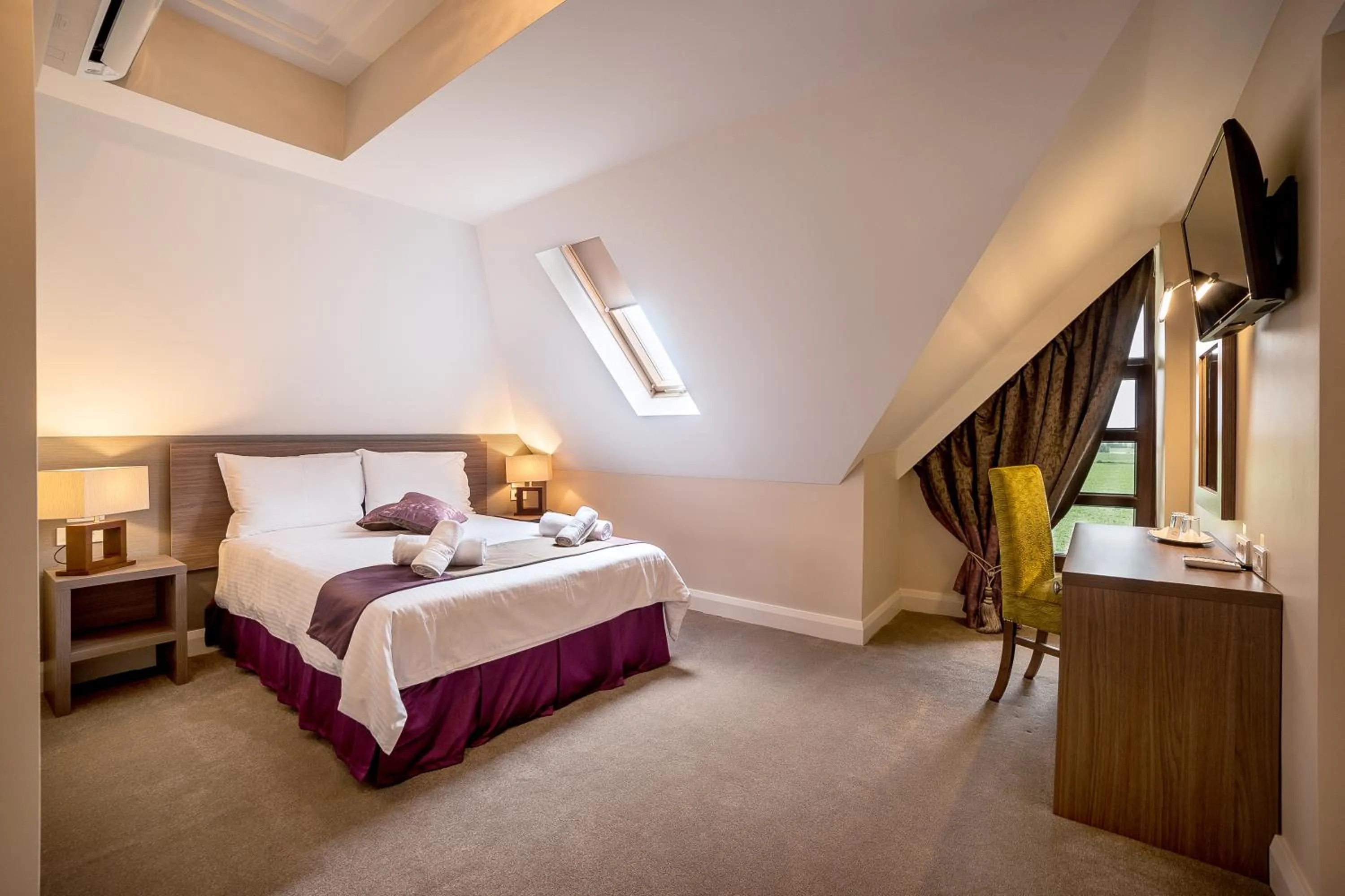 Bed in The Frontier Hotel