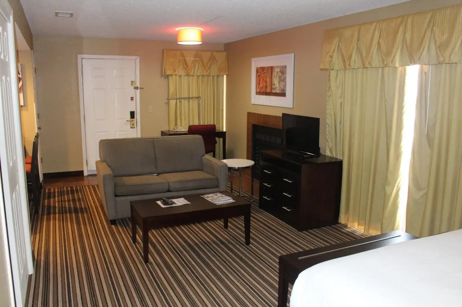 Living room, Bed in Hawthorn Extended Stay by Wyndham Wichita Living room, Bed in Hawthorn Extended Stay by Wyndham Wichita