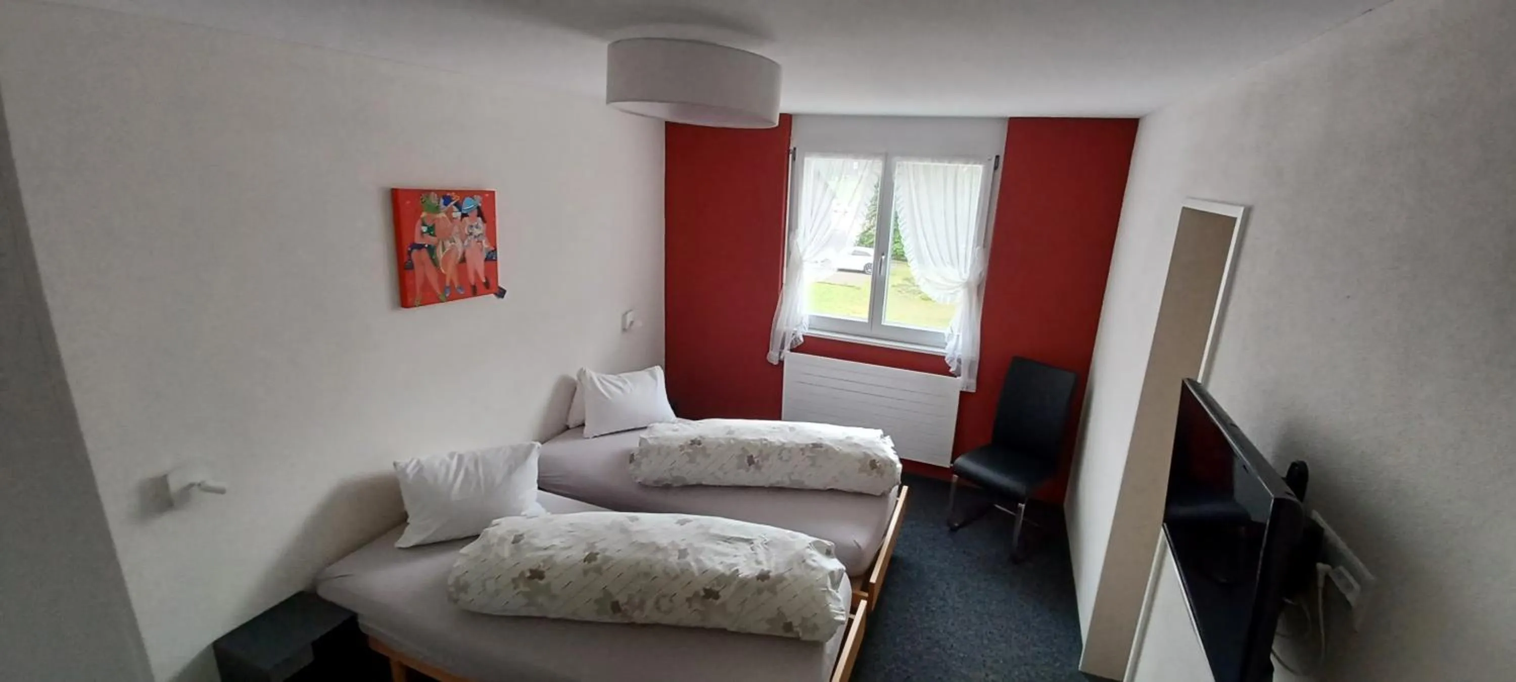 Photo of the whole room, Bed in Hotel / Restaurant Post