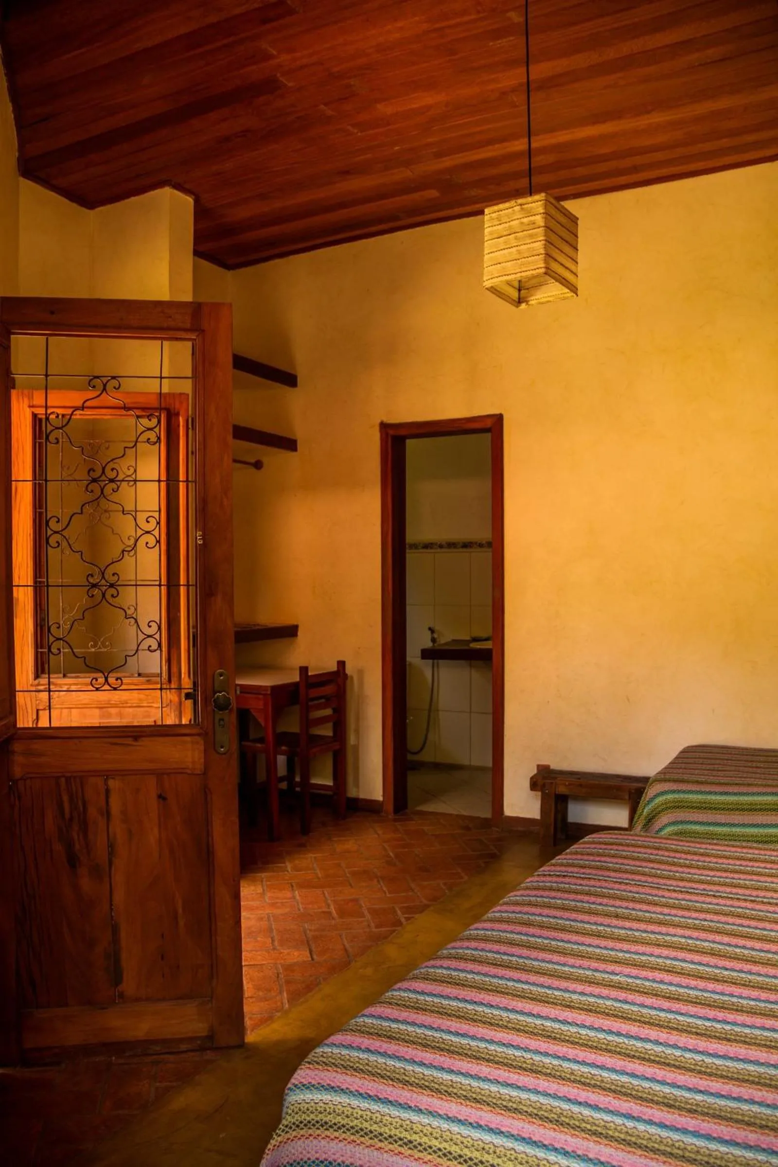 Bed in Pousada Opicodocipo