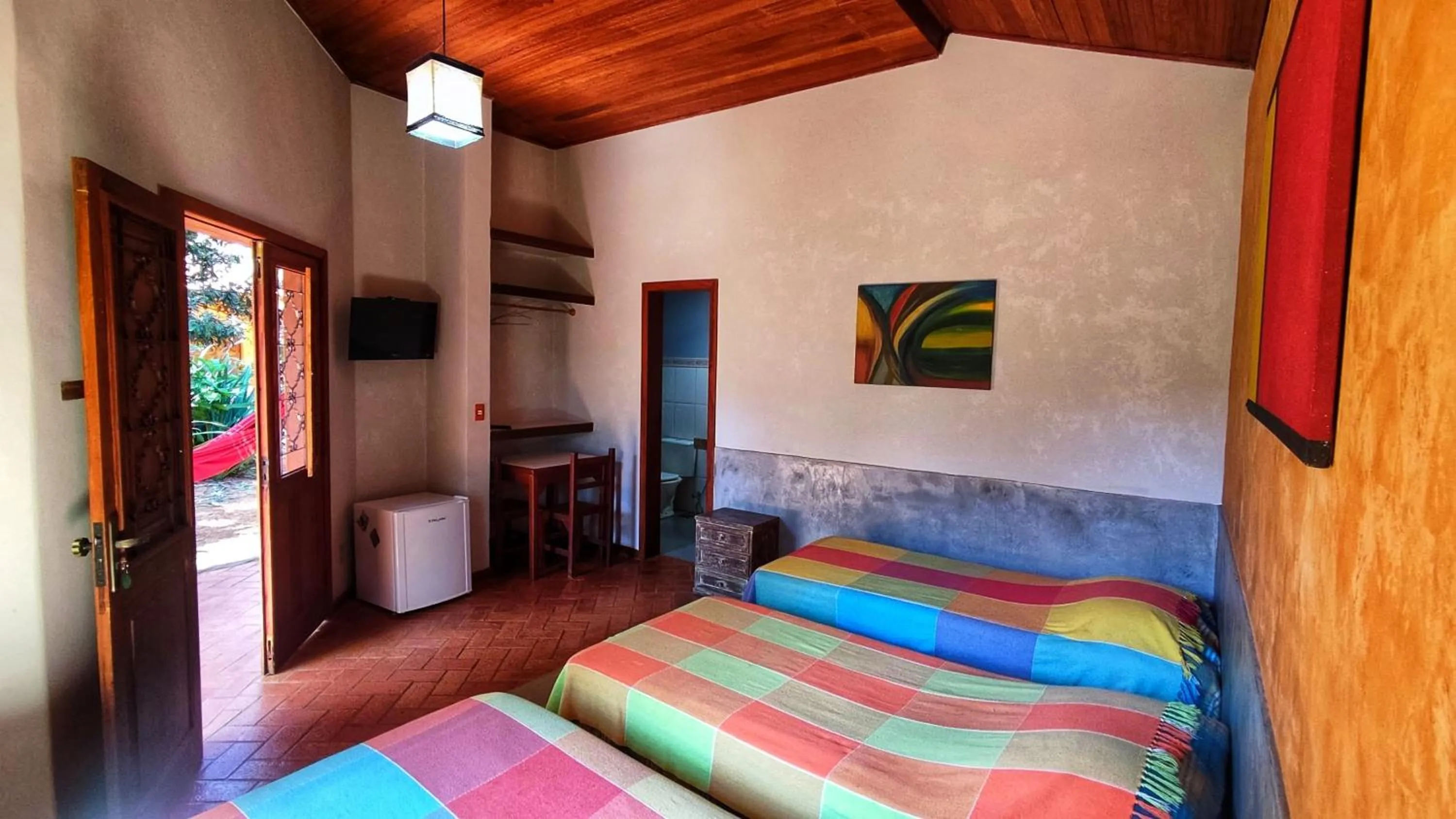 Bed in Pousada Opicodocipo