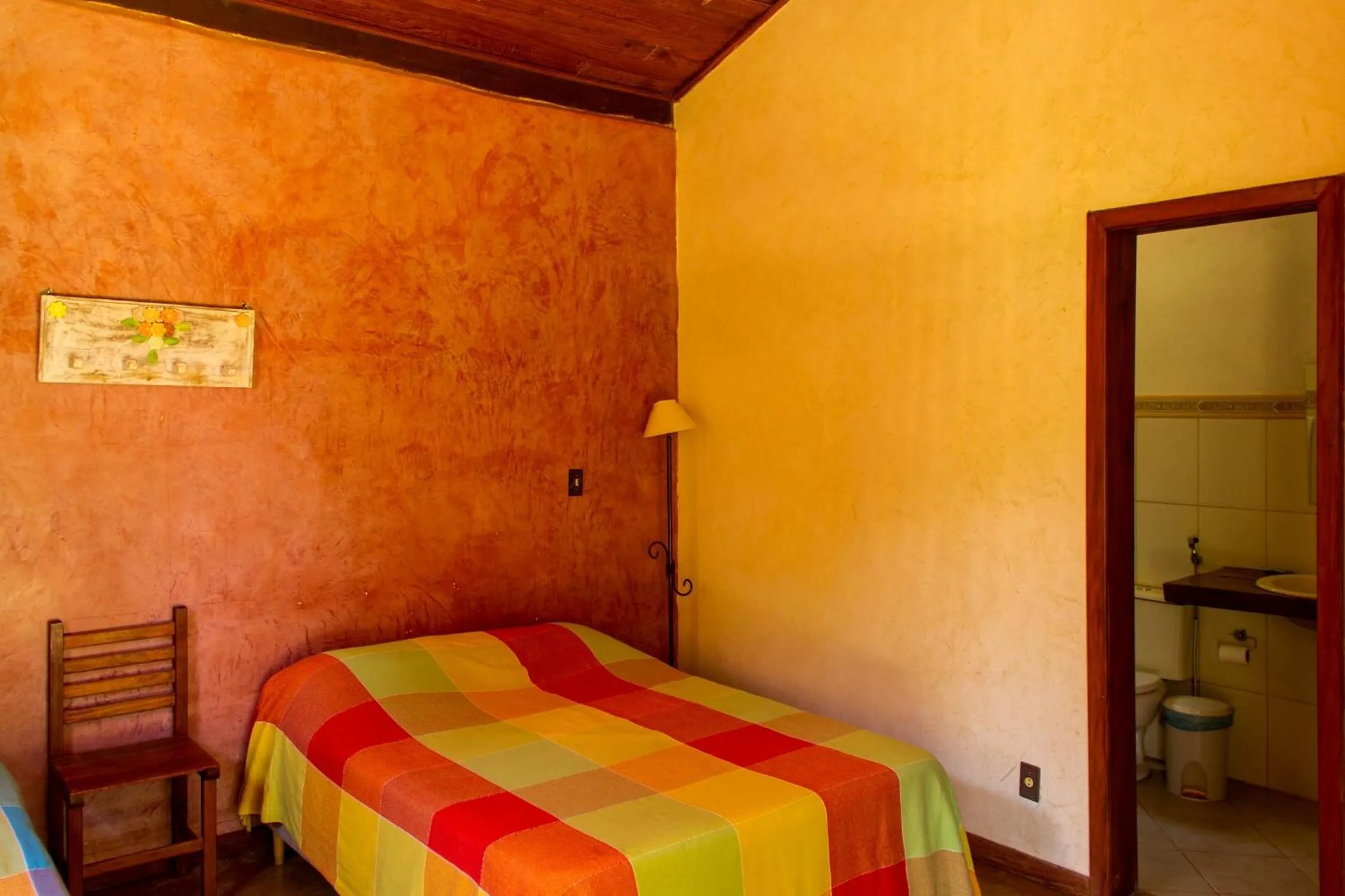 Bed in Pousada Opicodocipo