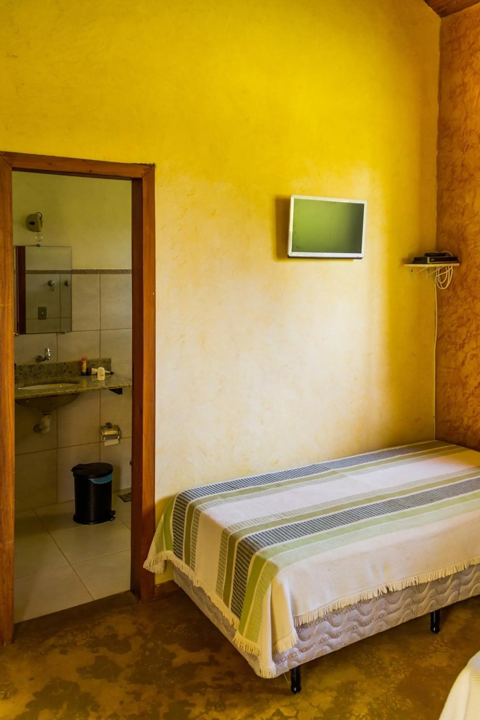 Bed in Pousada Opicodocipo