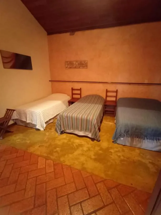 Bed in Pousada Opicodocipo