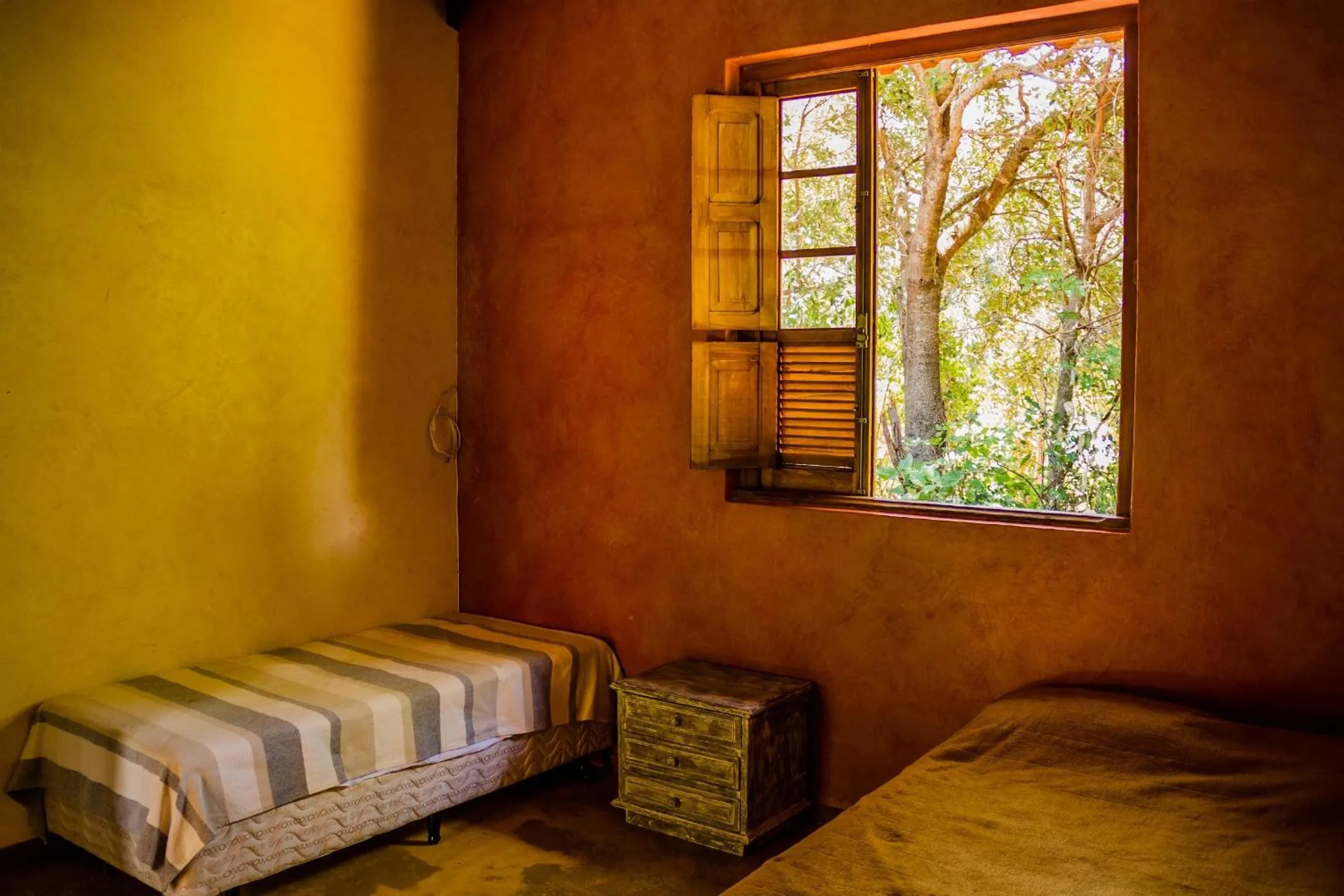 Bed in Pousada Opicodocipo
