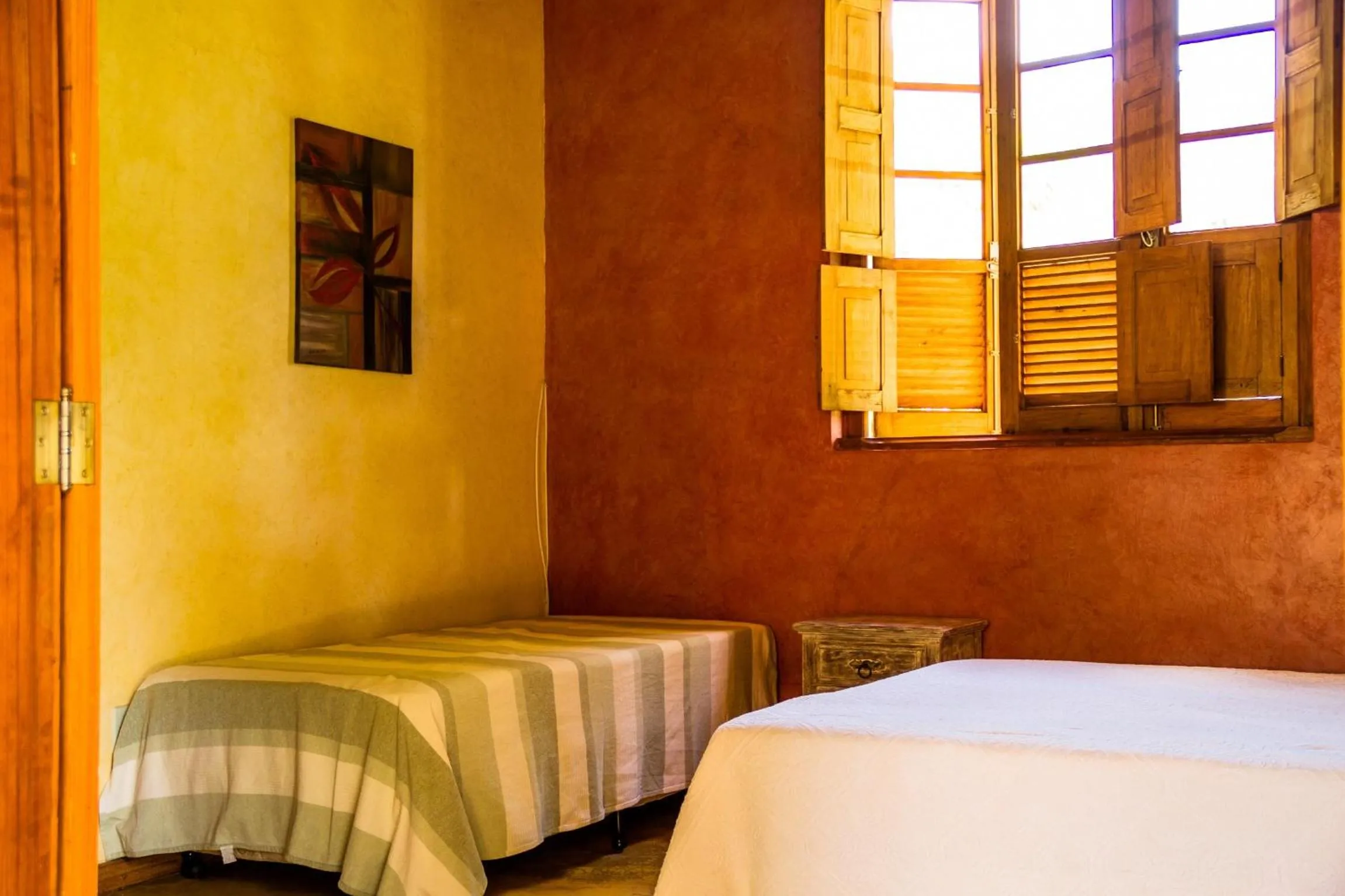 Bed in Pousada Opicodocipo