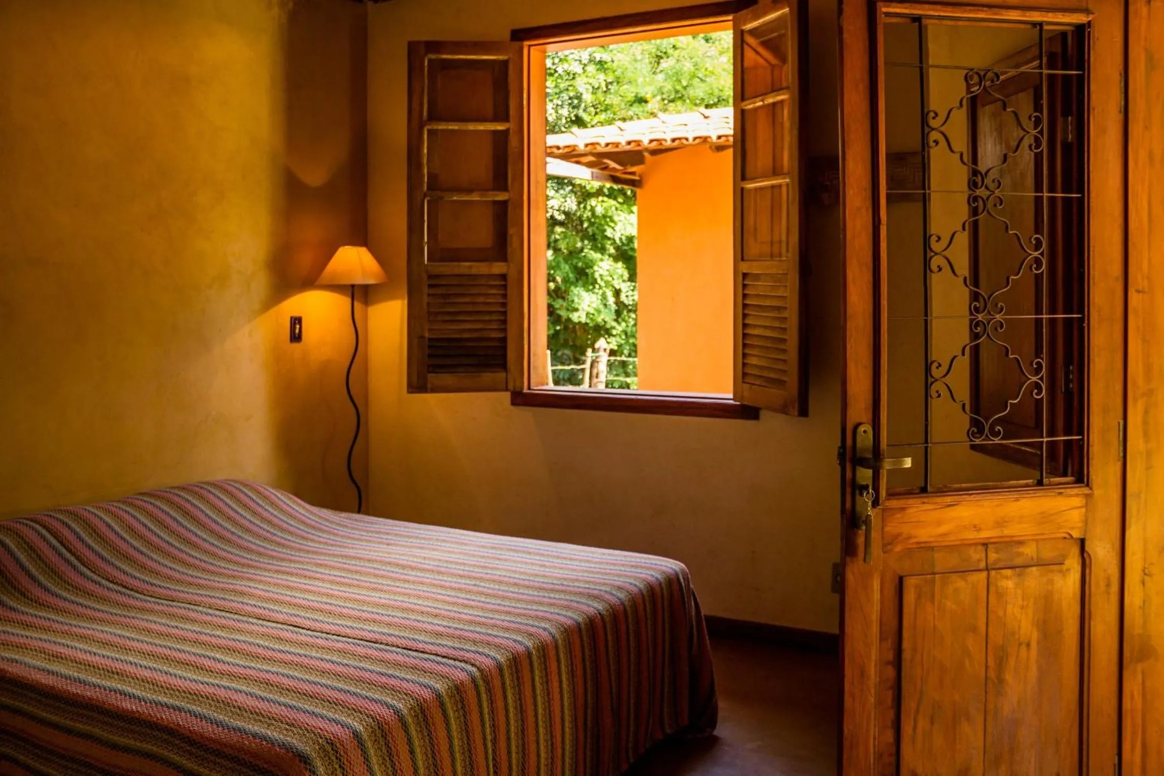 Bed in Pousada Opicodocipo