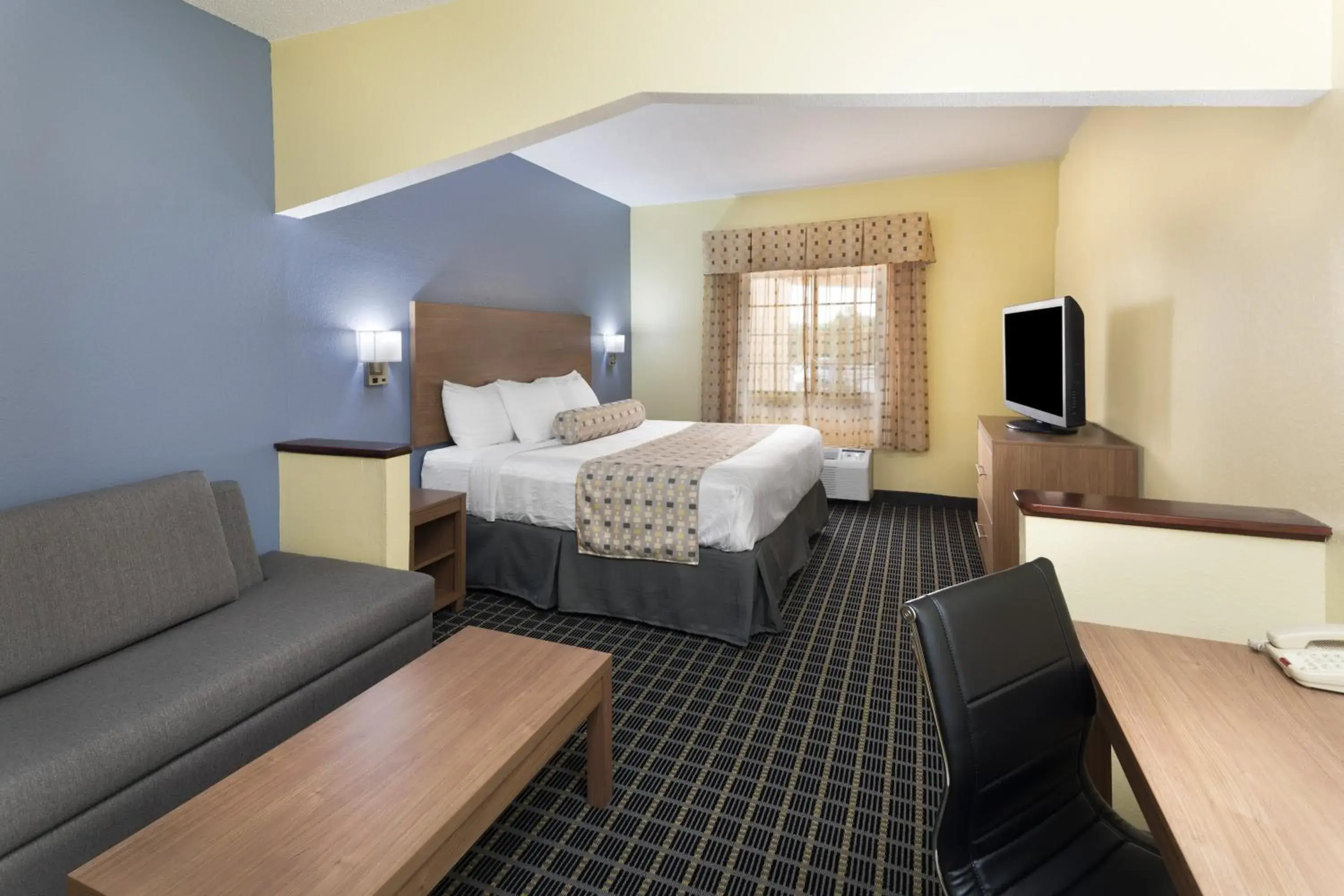 Photo of the whole room, Bed in Days Inn & Suites by Wyndham Union City Photo of the whole room, Bed in Days Inn & Suites by Wyndham Union City