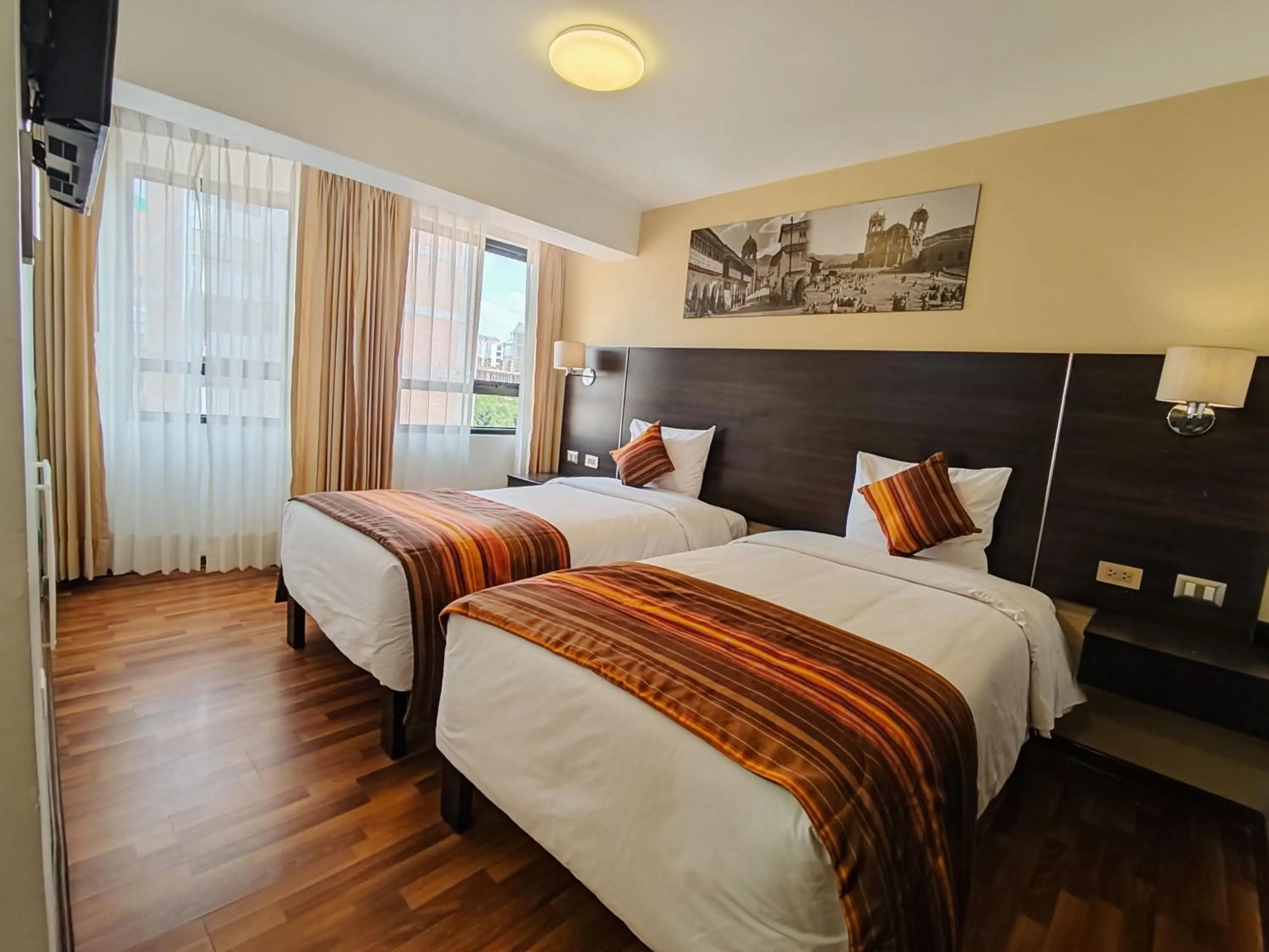 Bed in Royal Inn Cusco Hotel