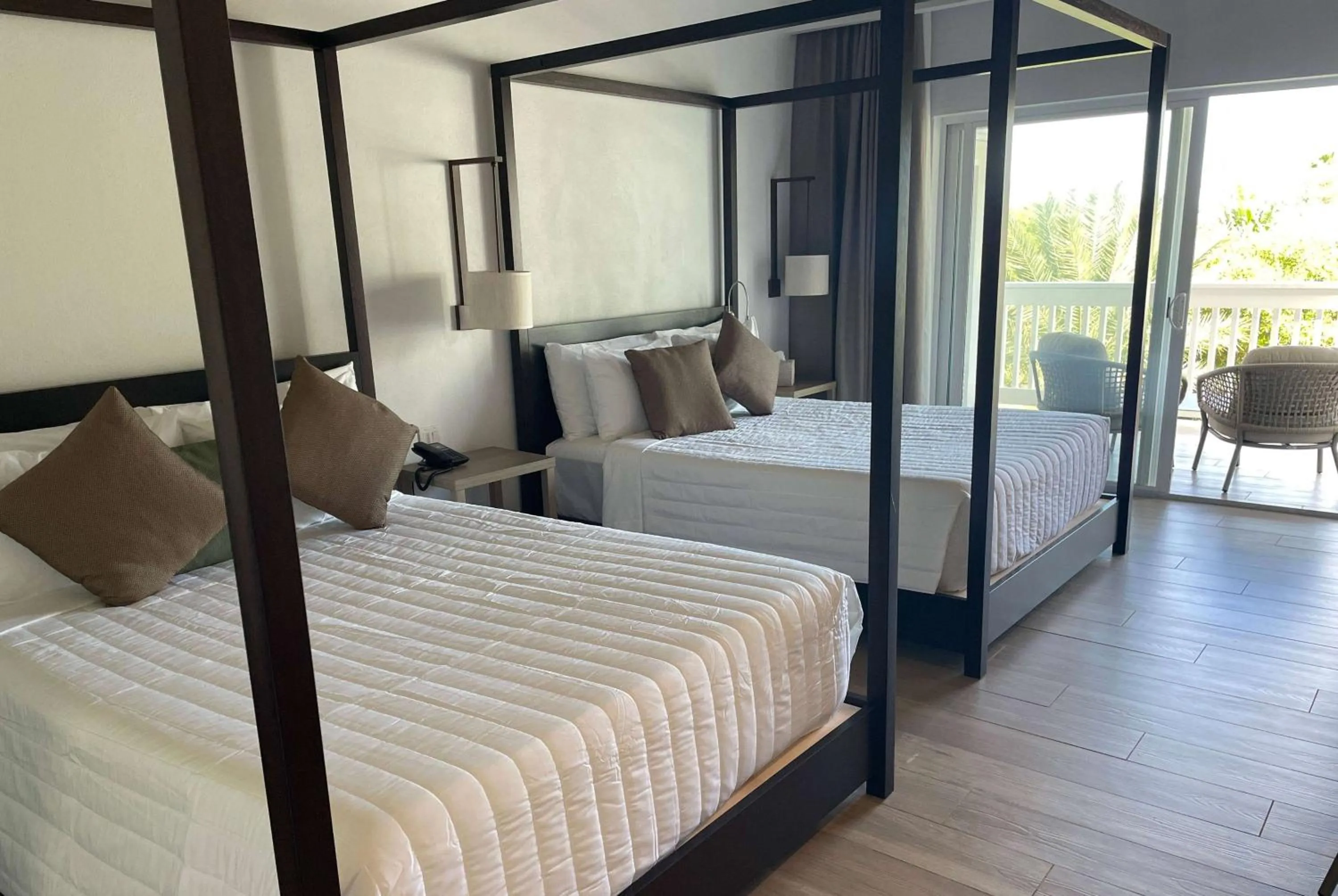 Photo of the whole room, Bed in Wyndham Tortola BVI Lambert Beach Resort