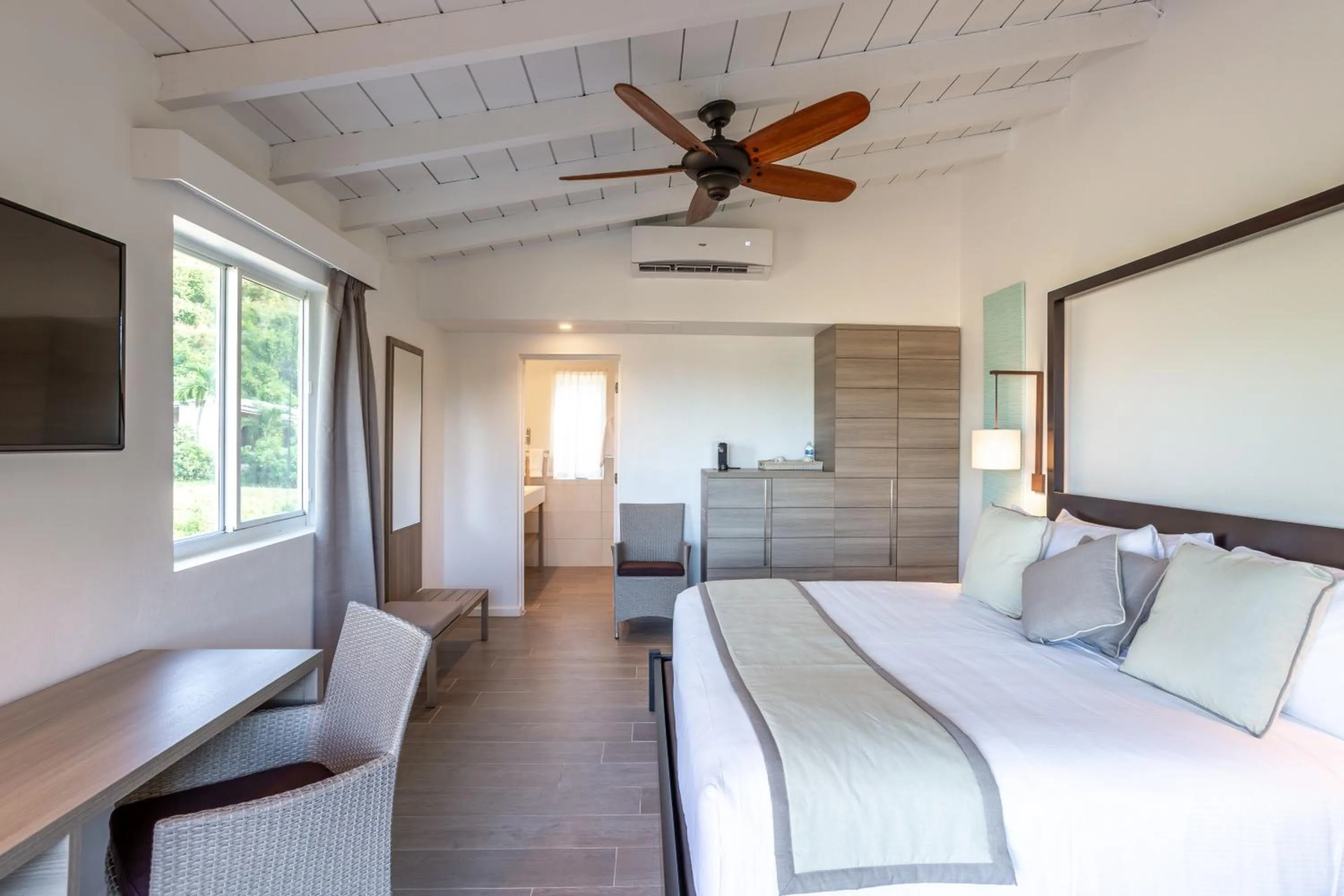 Photo of the whole room, Bed in Wyndham Tortola BVI Lambert Beach Resort