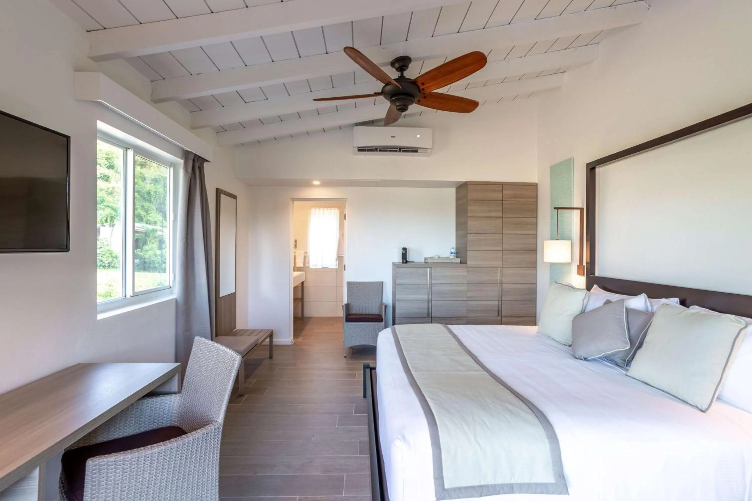 Photo of the whole room, Bed in Wyndham Tortola BVI Lambert Beach Resort