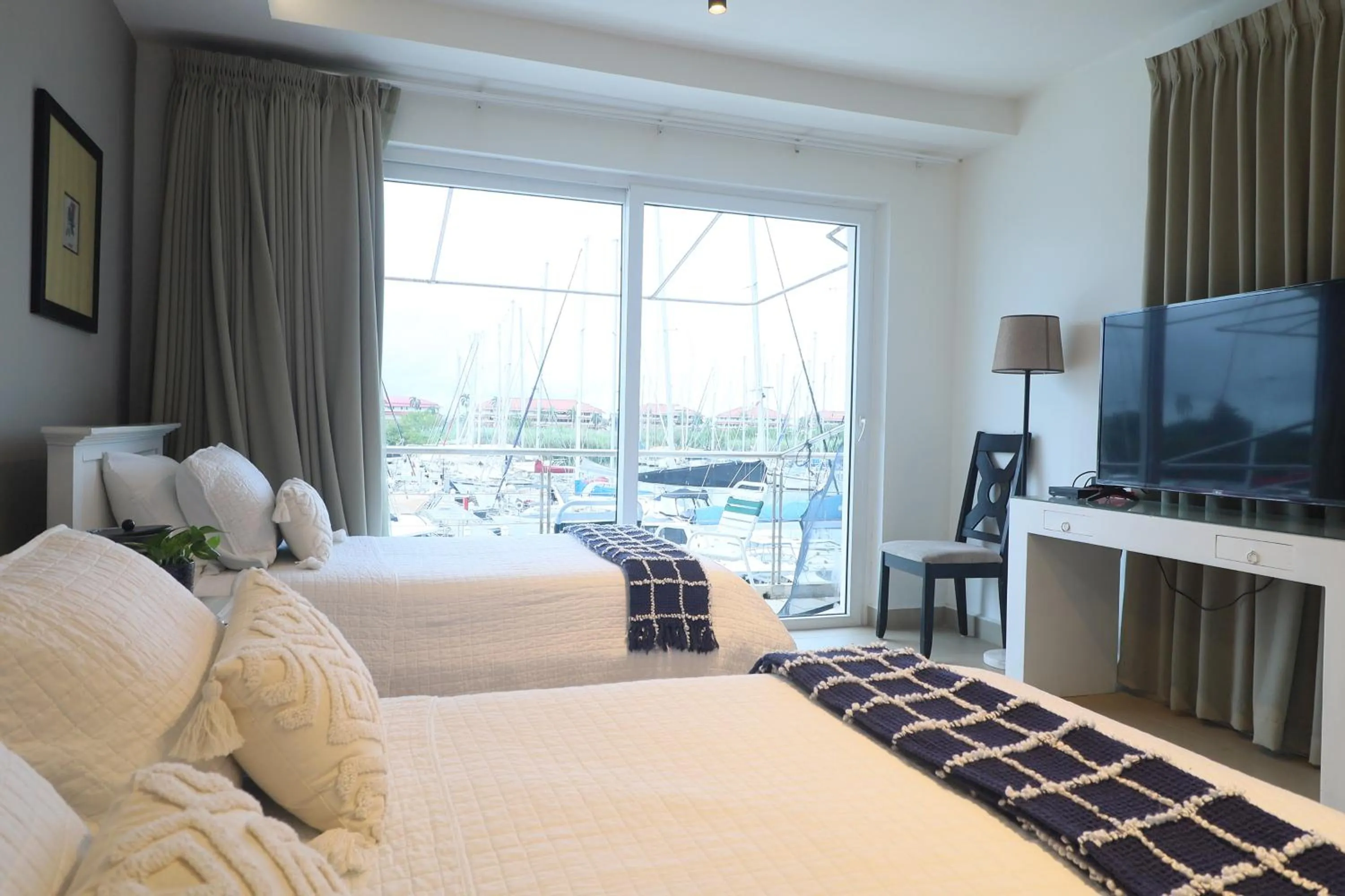 Bed in Marina Hotel at Shelter Bay