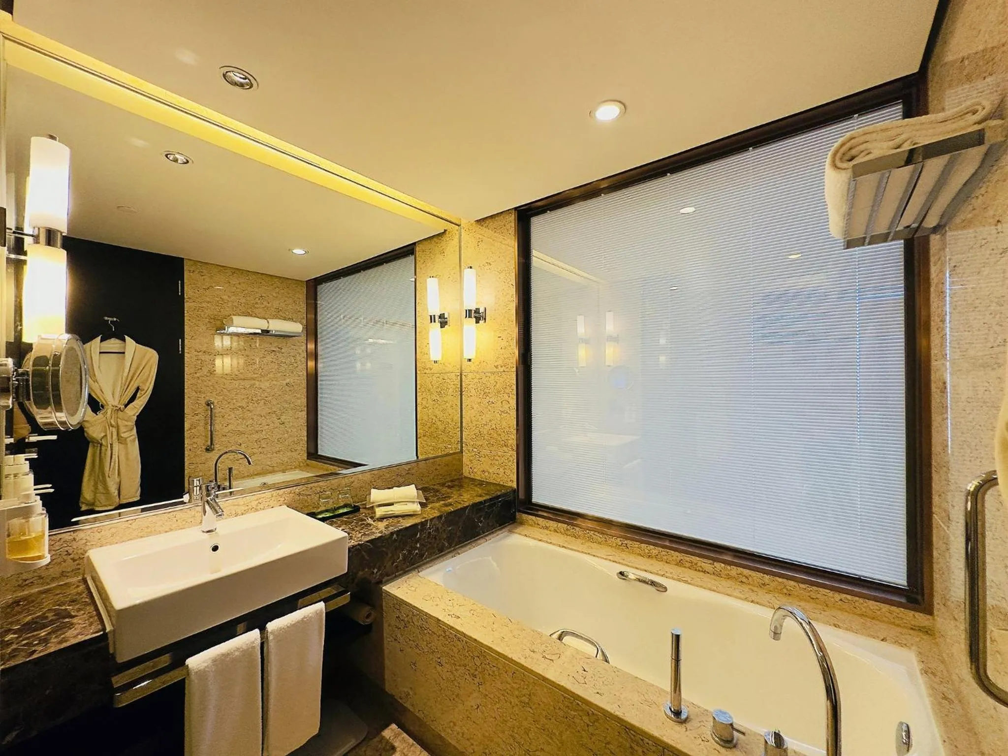 Bathroom in Holiday Inn Nantong Oasis International by IHG