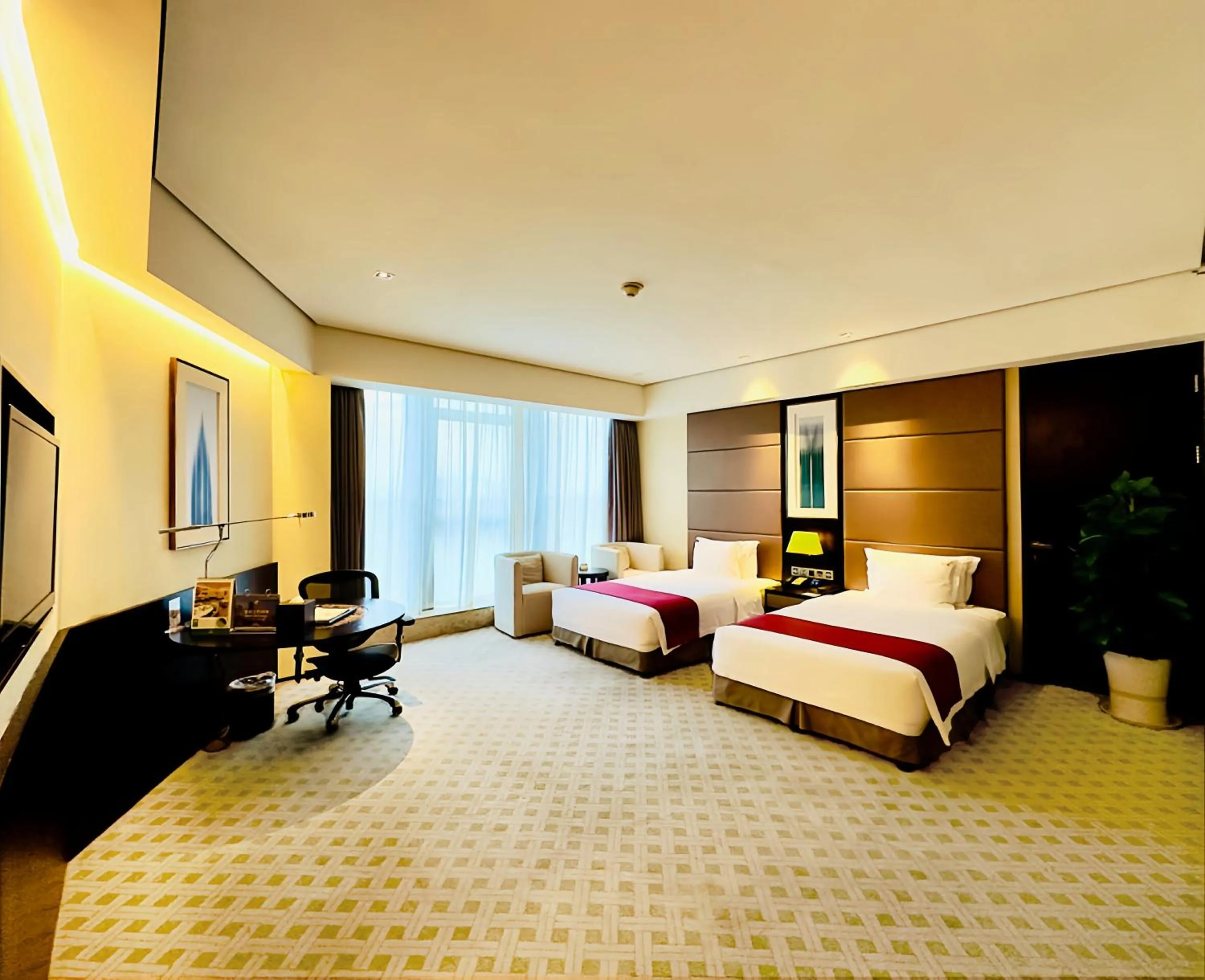 Bed in Holiday Inn Nantong Oasis International by IHG