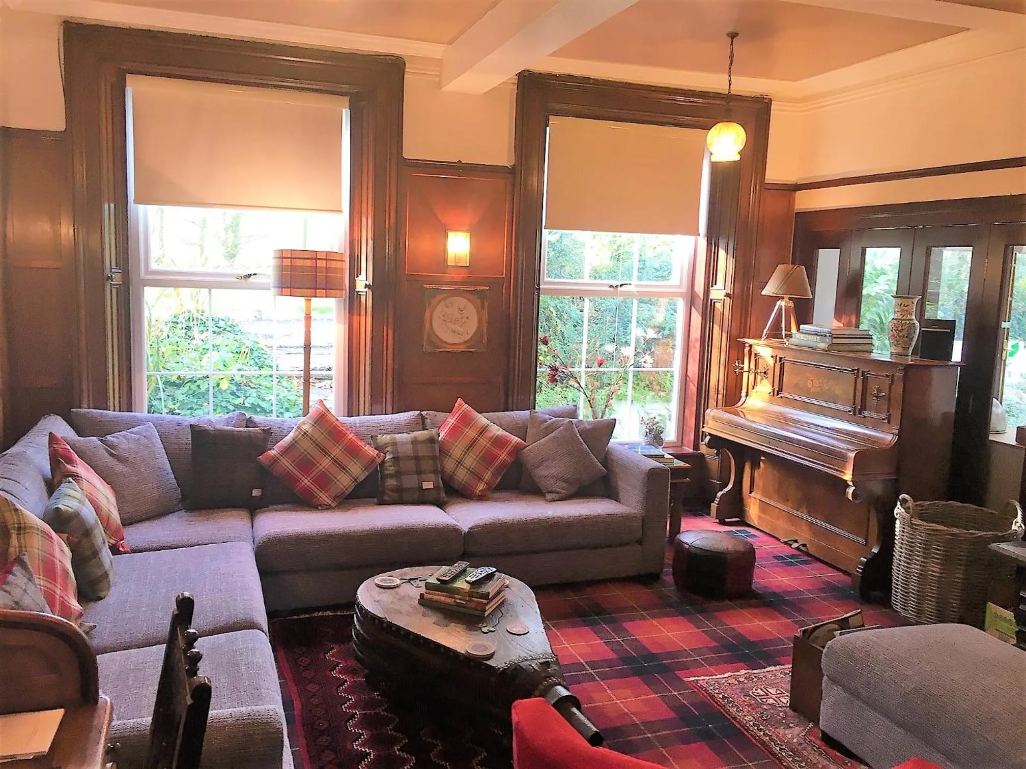 Communal lounge/ TV room in Torrs Warren Country House Hotel