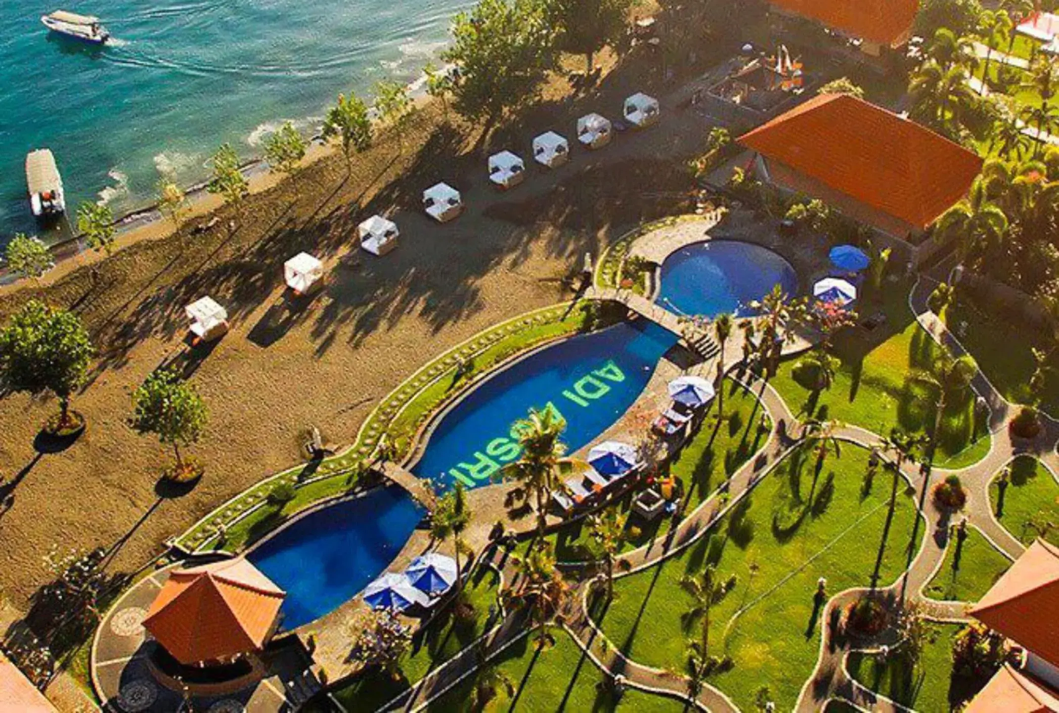 Pool view in Adi Assri Beach Resorts And Spa Pemuteran Pool view in Adi Assri Beach Resorts And Spa Pemuteran