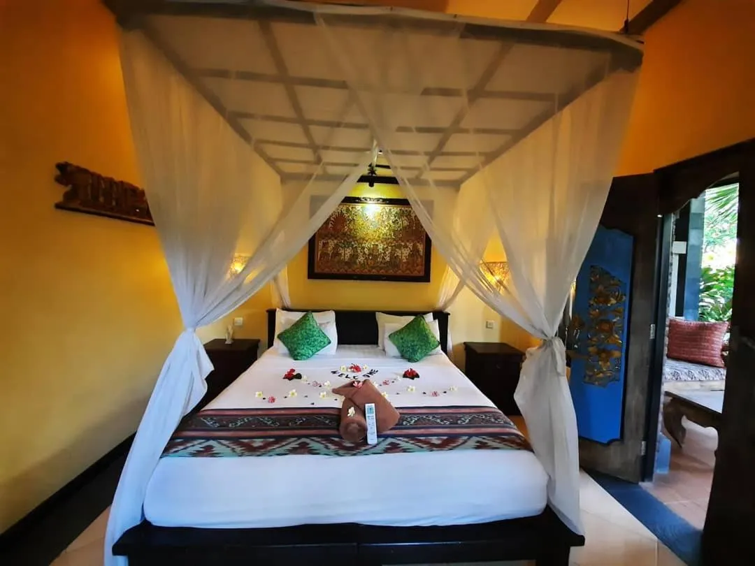 Bed in Tirta Sari Bungalow
