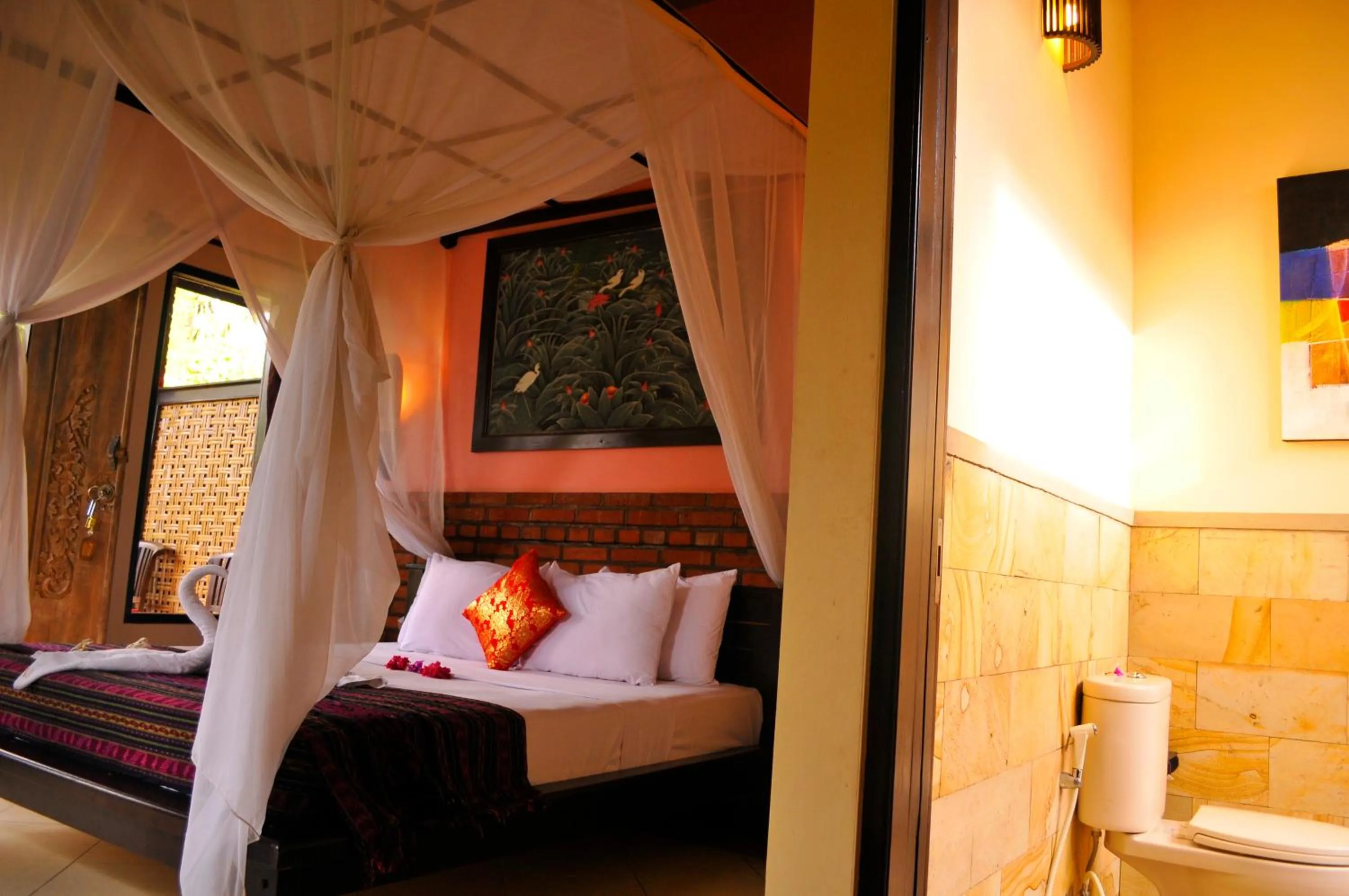 Bathroom, Bed in Tirta Sari Bungalow