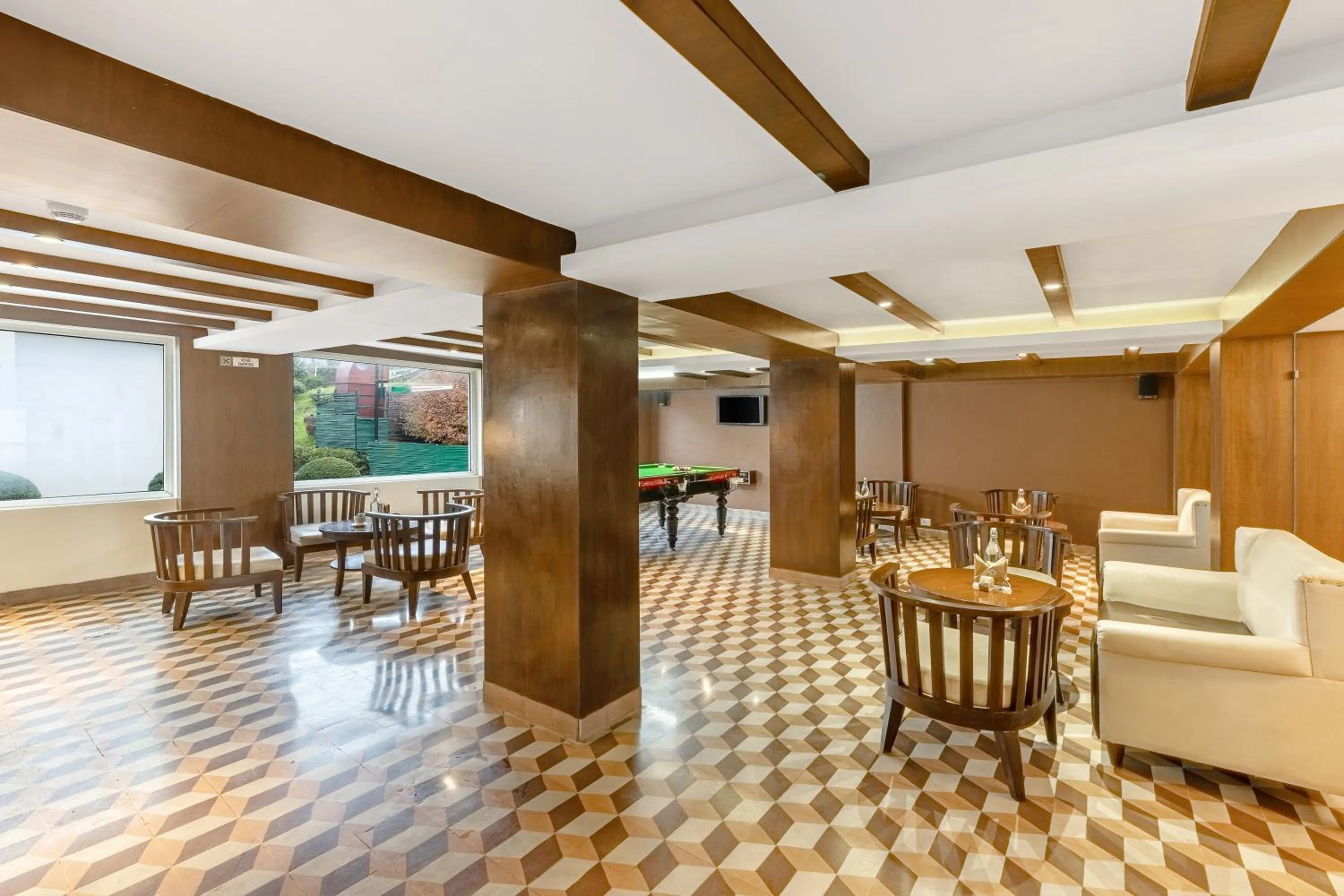 Communal lounge/ TV room in Sterling Darjeeling