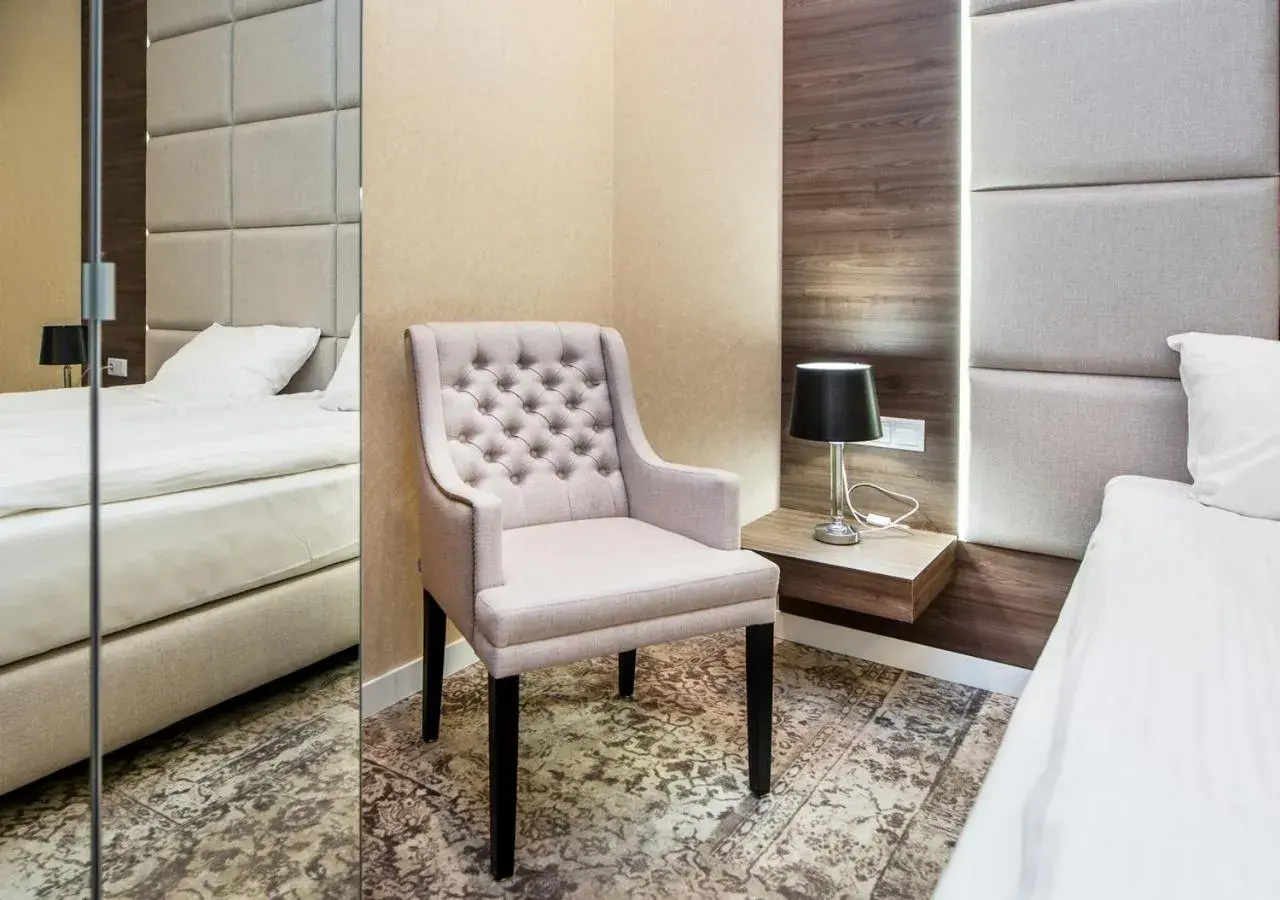 Seating area, Bed in Aparthotel Rakowicka Residence Seating area, Bed in Aparthotel Rakowicka Residence