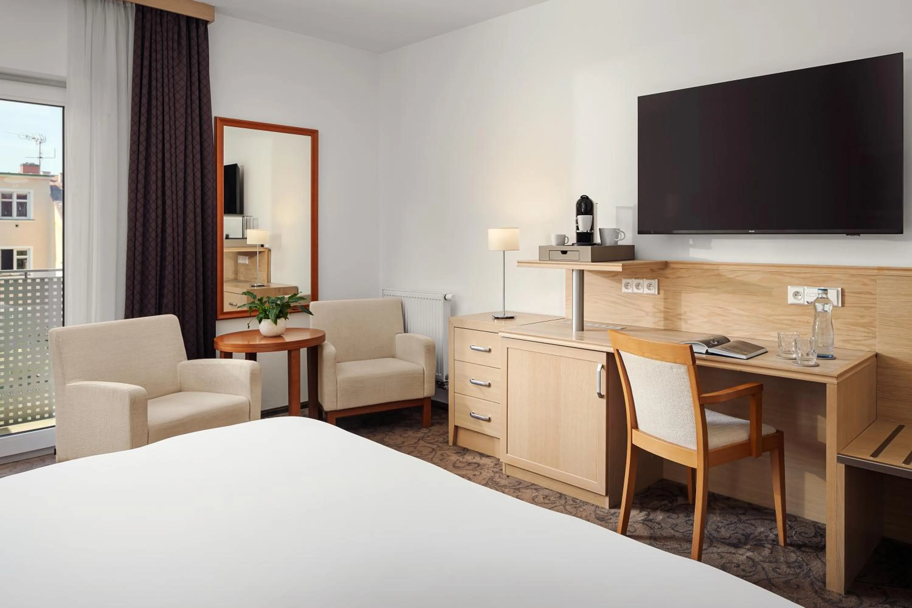 Bed in Harvey Spa Hotel