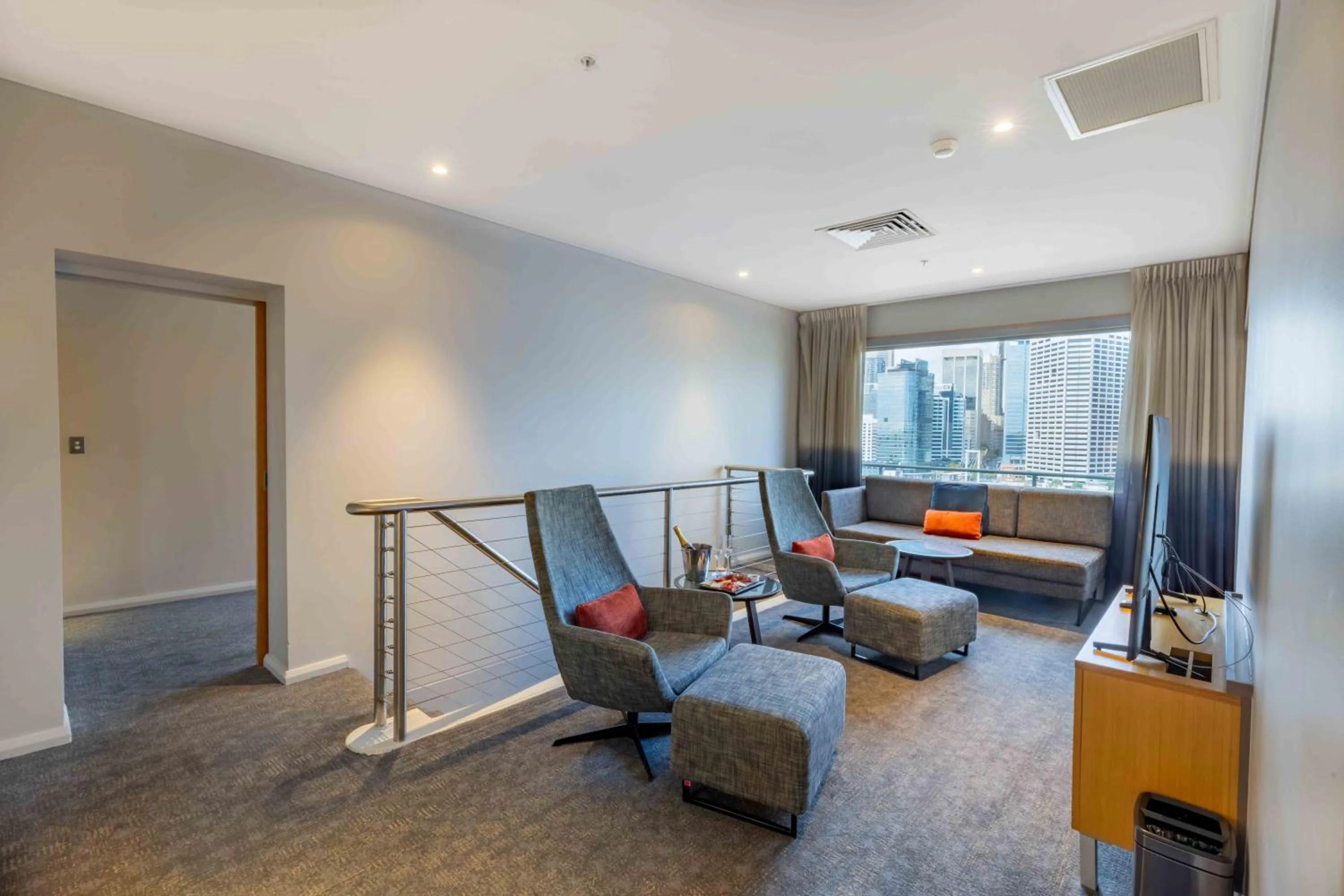 Living room in Novotel Sydney Darling Harbour