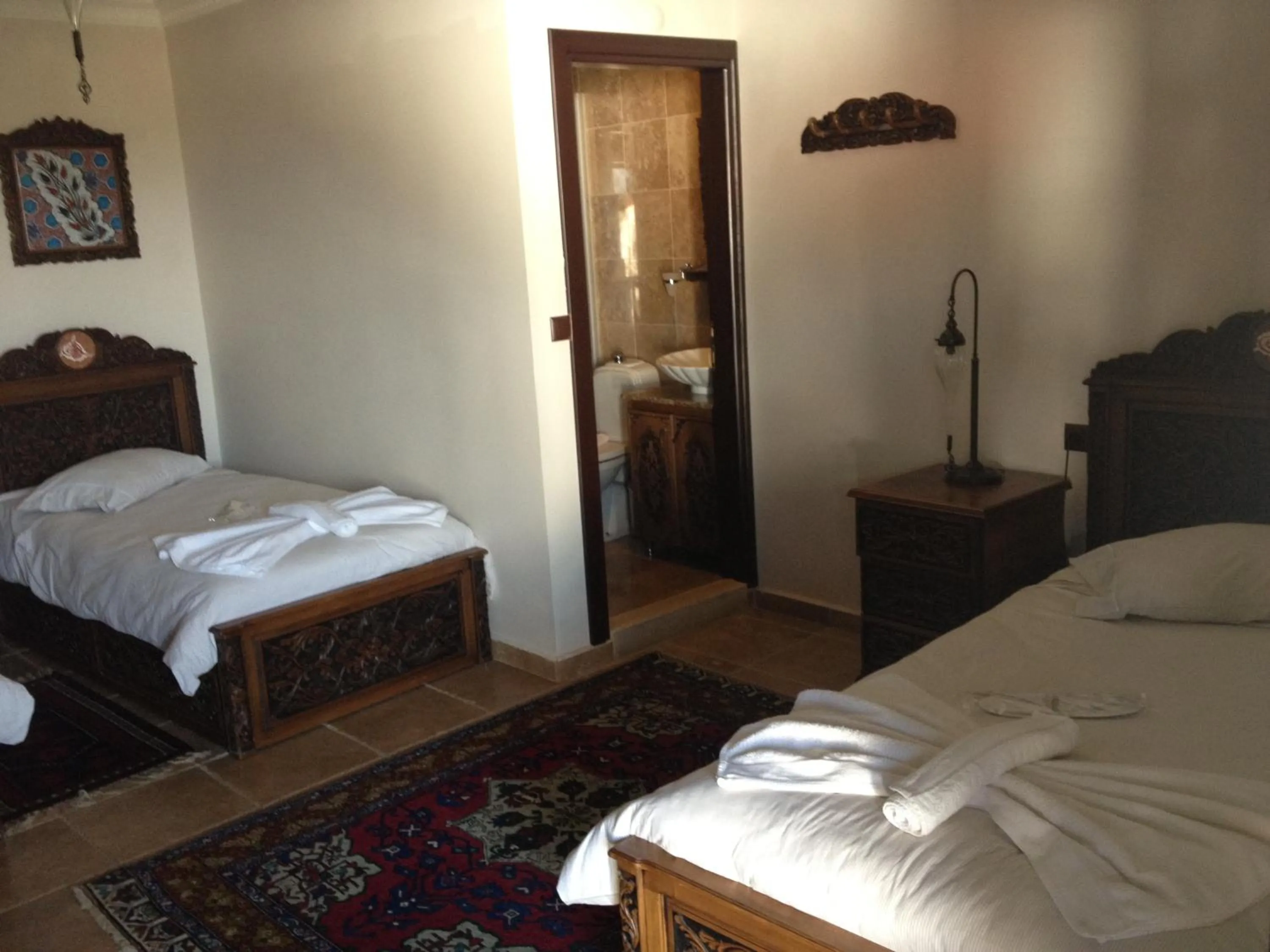 Photo of the whole room, Bed in Nilya Hotel