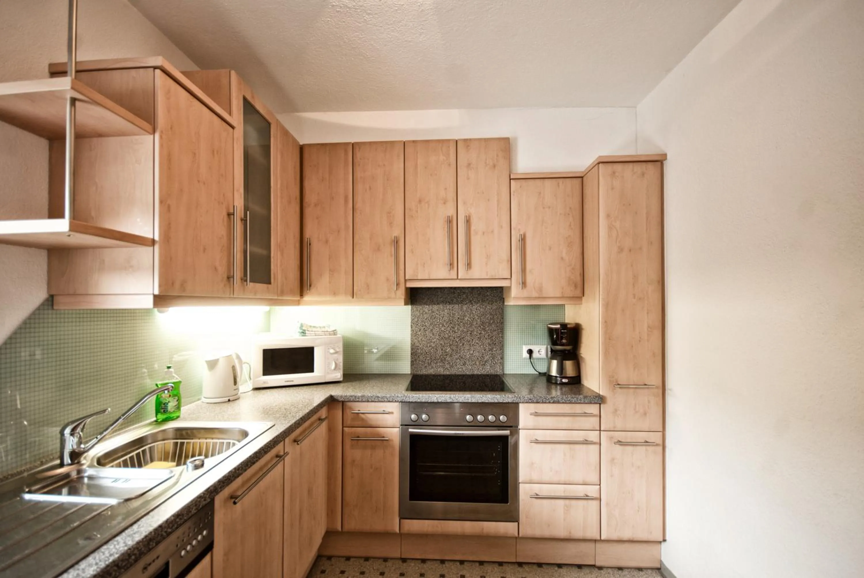 Kitchen or kitchenette in Aparthotel Fernblick