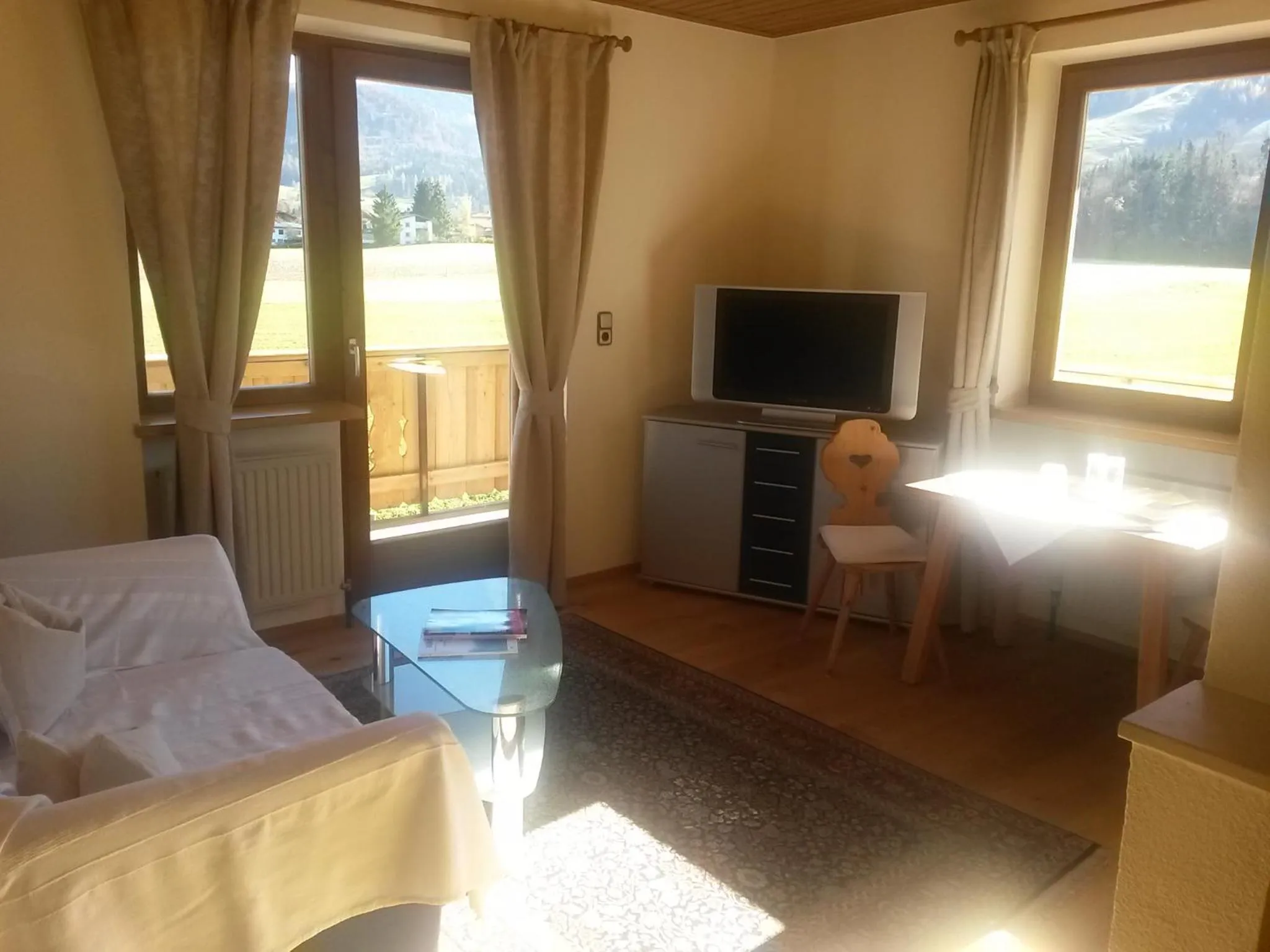 Living room, Bed in Landhaus Greiderer