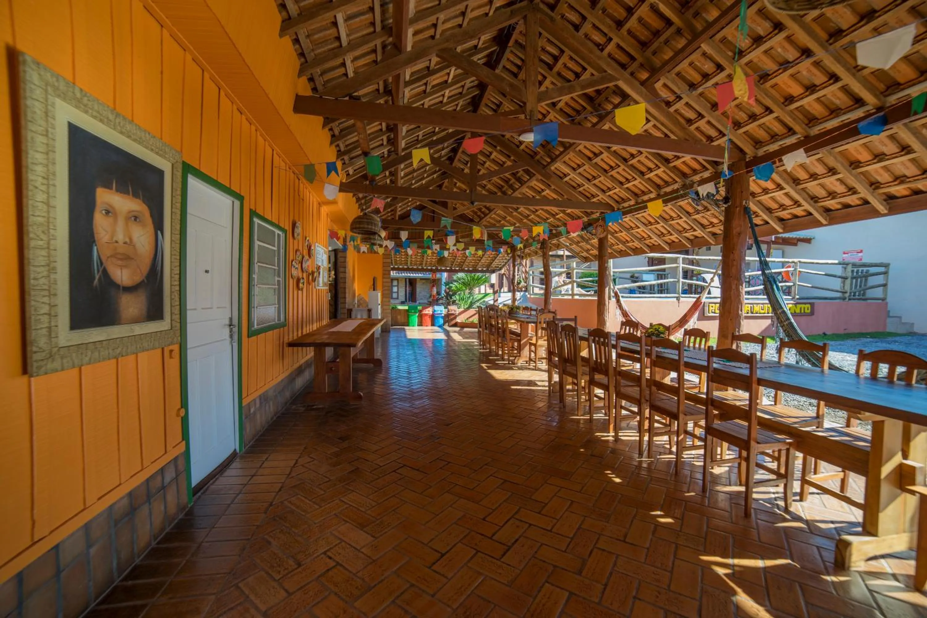Communal lounge/ TV room in Pousada Muito Bonito